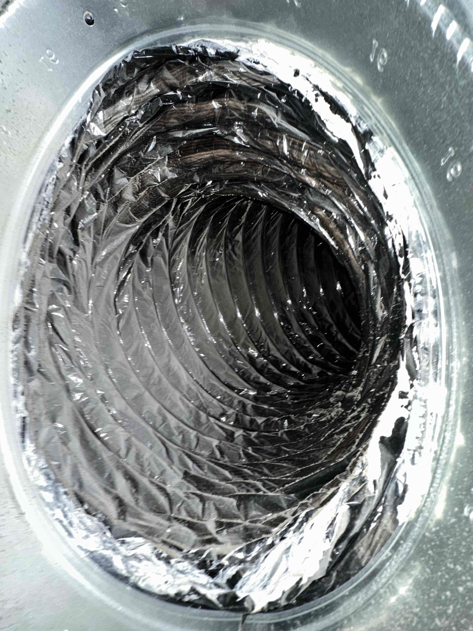 I performed a single system maintenance on a 2017 zoned gas system. I checked amps, filter, electrical, cleanliness, and safeties. I observed that a damper motor was actively trying to fail, the blower wheel was dirty, and the air quality could be improved. I provided options to address these concerns. Below is the work I provided at the time of service. System is heating upon departure.

Blower cleaning allows us to remove the dust build up on the wheel. This dust causes drag on the motor and added wear to the internal bearings. 

The upstairs damper motor is not wanting to spring all the way open. It can be manually opened the rest of the way. This is a sign of future failure. 