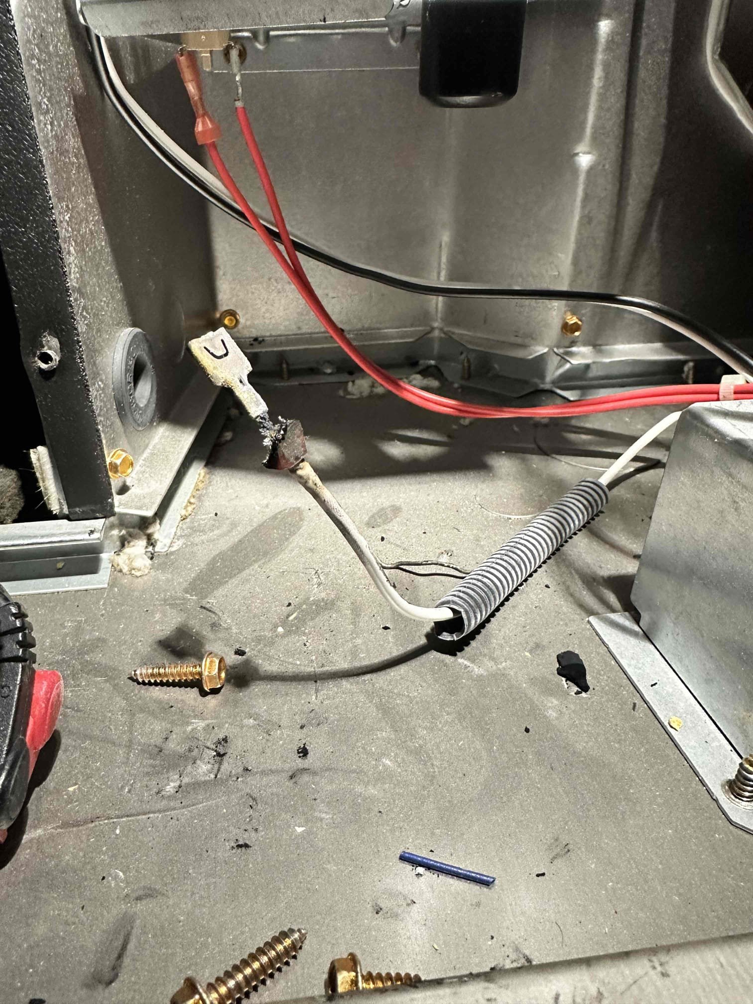 Upon arrival, I found that the thermostat was blank. I proceeded to the attic and discovered a safety lock out code. This systems appears to have had the inducer motor replaced. I discovered the flame sensor wire was burnt up, the manifold is completely matted with soot, and the burners are covered in soot. I checked my gas pressure to the system. I only have 7inwc coming into the gas valve, and it should be 13inwc. I checked the supplied gas pressure through the gas valve. It is reading 2.2inwc, and it should be 3.5inwc. I assume with the low gas supply it caused an incomplete combustion. This caused soot build up and it began lighting the soot. We will need to price for a gas valve, 5 burner manifold, 5 burner guides, and a minor wire repair. I was instructed by the realtor to email the dispatch to the owner. The owner will likely want to get the gas company out asap to perform a pressure test.