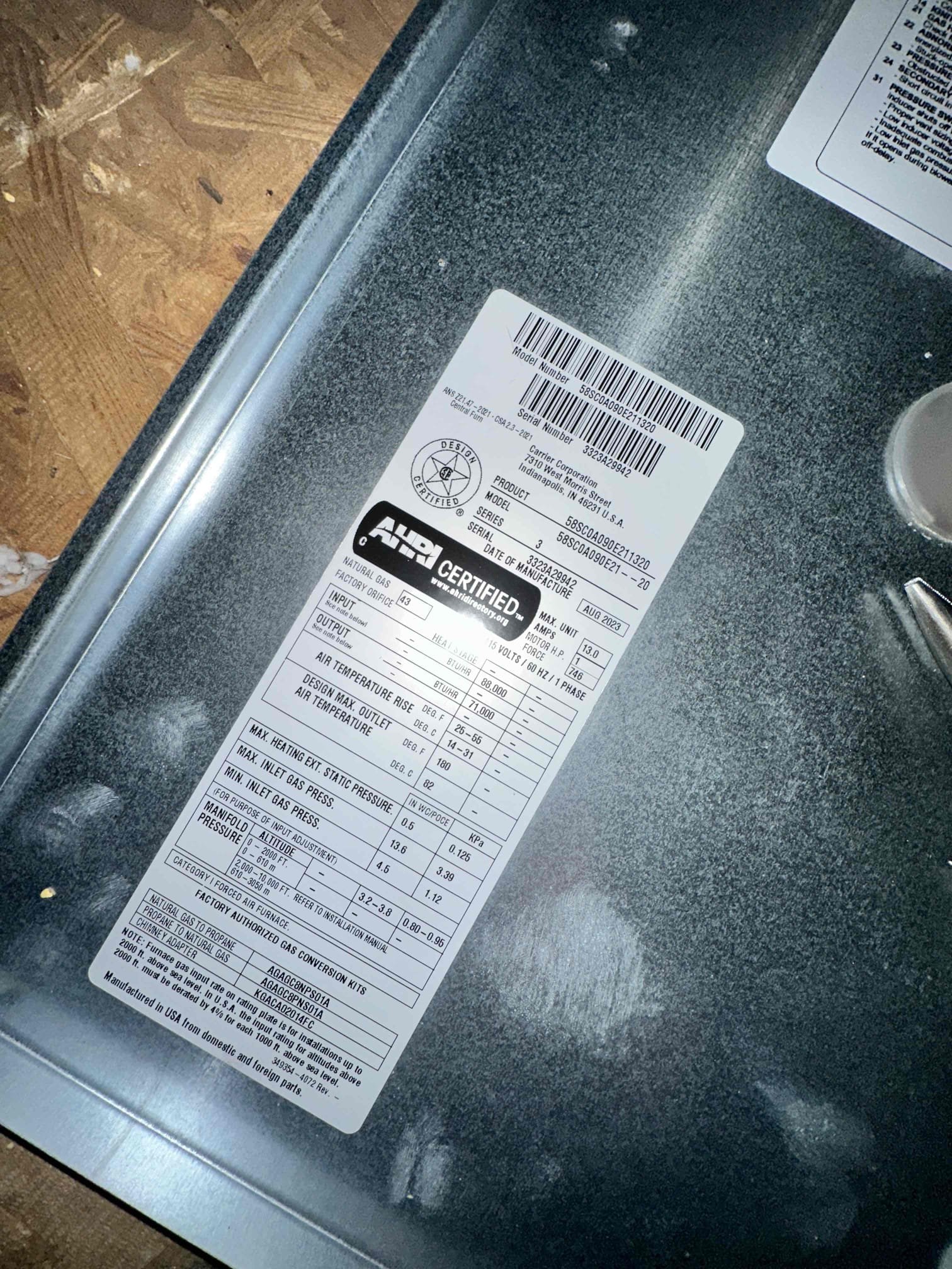 Upon arrival, I found that the thermostat was blank. I proceeded to the attic and discovered a safety lock out code. This systems appears to have had the inducer motor replaced. I discovered the flame sensor wire was burnt up, the manifold is completely matted with soot, and the burners are covered in soot. I checked my gas pressure to the system. I only have 7inwc coming into the gas valve, and it should be 13inwc. I checked the supplied gas pressure through the gas valve. It is reading 2.2inwc, and it should be 3.5inwc. I assume with the low gas supply it caused an incomplete combustion. This caused soot build up and it began lighting the soot. We will need to price for a gas valve, 5 burner manifold, 5 burner guides, and a minor wire repair. I was instructed by the realtor to email the dispatch to the owner. The owner will likely want to get the gas company out asap to perform a pressure test.