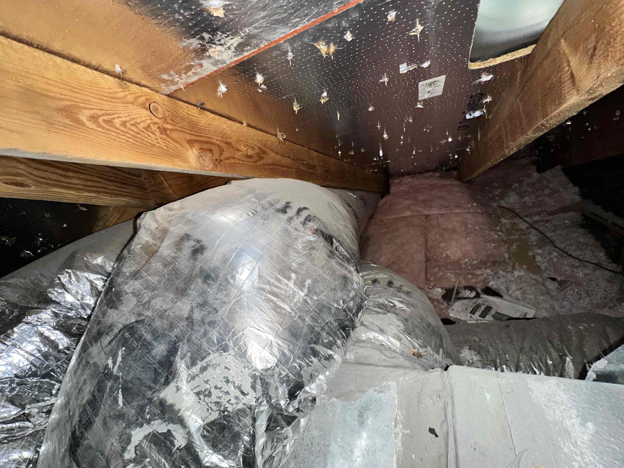 Jesse and I arrived and spoke with the homeowner about the rooms that are having air issues. We investigated the ducts at the system and discovered a single damper on the downstairs system. Also, we spoke about upgrading thermostats to allow sensors to be used. We uploaded the notes that were taking during the visit. The upstairs damper are 9, 9, and 7. The downstairs could not be determined, and we will need to bring multiple sizes to address it. There is 5 ducts I can see. The backside of the unit has very limited space.