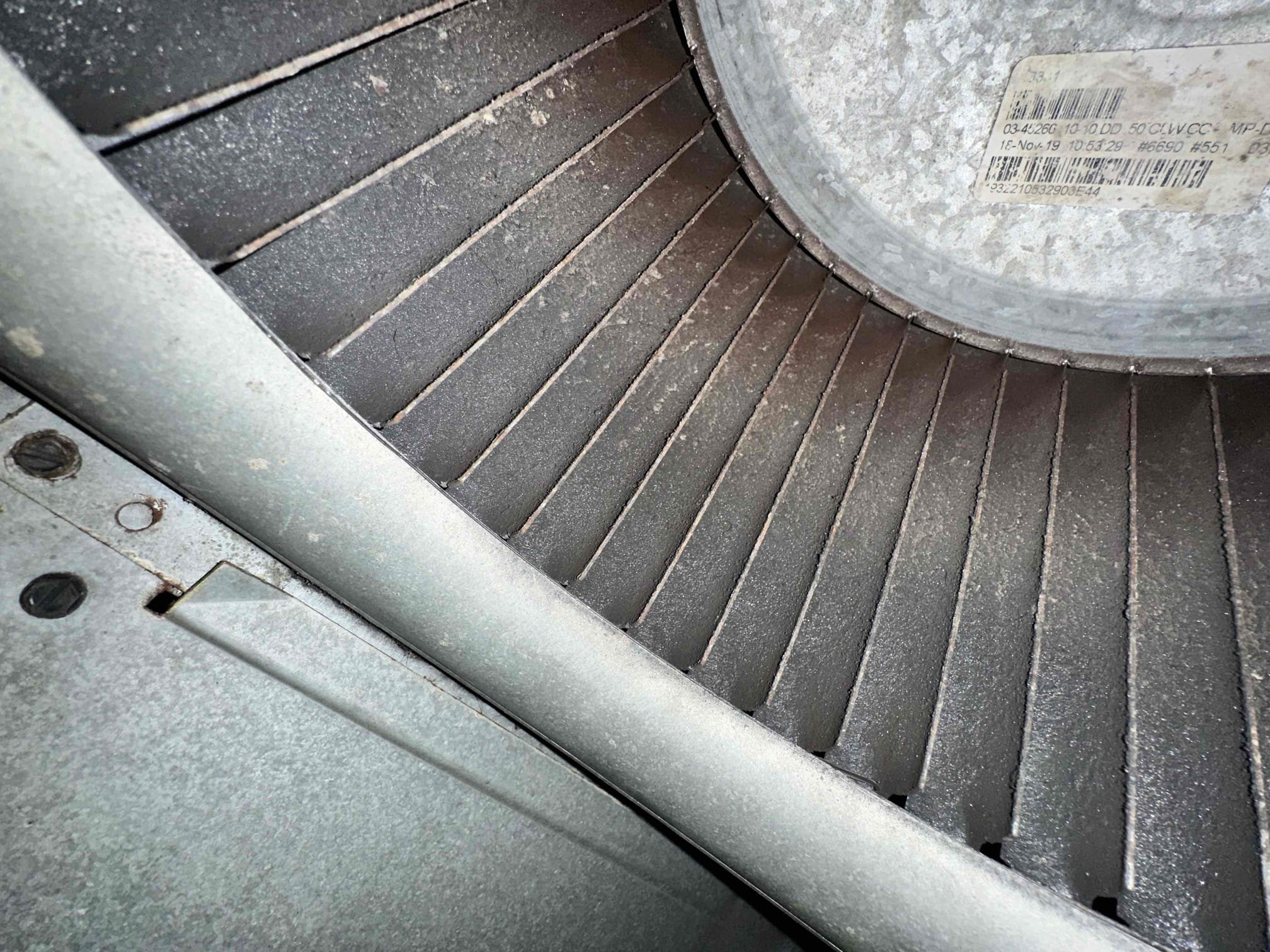 Upon arrival, I investigated the noise in question. The blower wheel is spinning out of balance. I confirmed that the blower shaft is not wobbling when it spins, the motor is secure, and the keeper bolt is tight. The wheel is spinning and shaving the blower housing. It appears as if the wheel has warped causing this. Due to the unknown damage that may have happened, it is advised to replace the blower motor, blower wheel, and the blower housing. Customer has not had maintenance and AdonCPS has not been out since the install of the equipment in August of 2020. We will need to reach out to York on Monday to verify warranty and part availability.