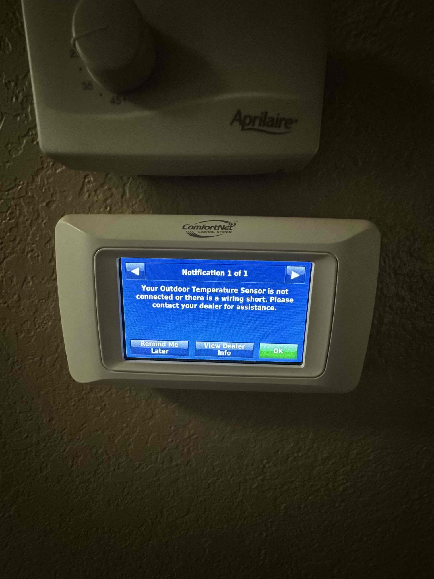 Upon arrival, I discovered that the thermostat had an error for the outdoor temperature sensor. I removed and tested the sensor. We replaced he sensor under parts and labor warranty. After power cycling the system, the code disappeared. 