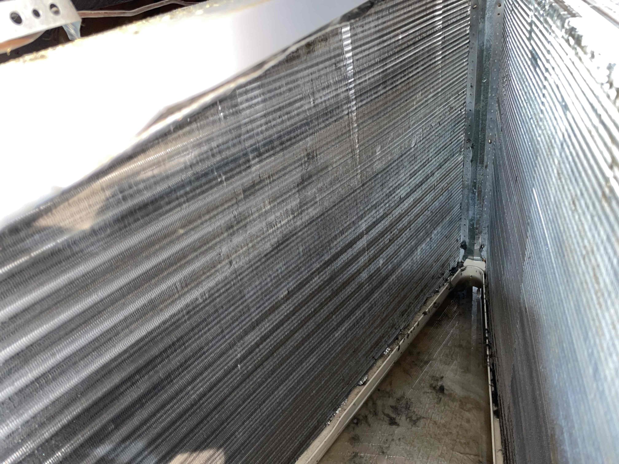 Frisco, TX - Indoor Blower and Evaporator Coil Inspection – Upstairs & Downstairs Systems

During our inspection, we found that both the upstairs and downstairs indoor blowers and evaporator coils are extremely dirty and in need of a thorough cleaning and sanitization.

Blower Cleaning:
The indoor blower assemblies are heavily coated with accumulated dirt, dust, and debris. To properly restore airflow and maintain system efficiency, the blower will need to be completely removed from the system. The entire blower cage will be professionally cleaned to eliminate all contaminants. This step is critical because a dirty blower reduces airflow, forces the system to work harder, and can significantly shorten the life of the motor.

Evaporator Coil Cleaning and Sanitization:
The evaporator (Raptor) coils in both systems are heavily contaminated and must be washed and sanitized. Dirty coils restrict airflow, reduce heat exchange efficiency, and can lead to higher energy consumption and uneven heating or coo