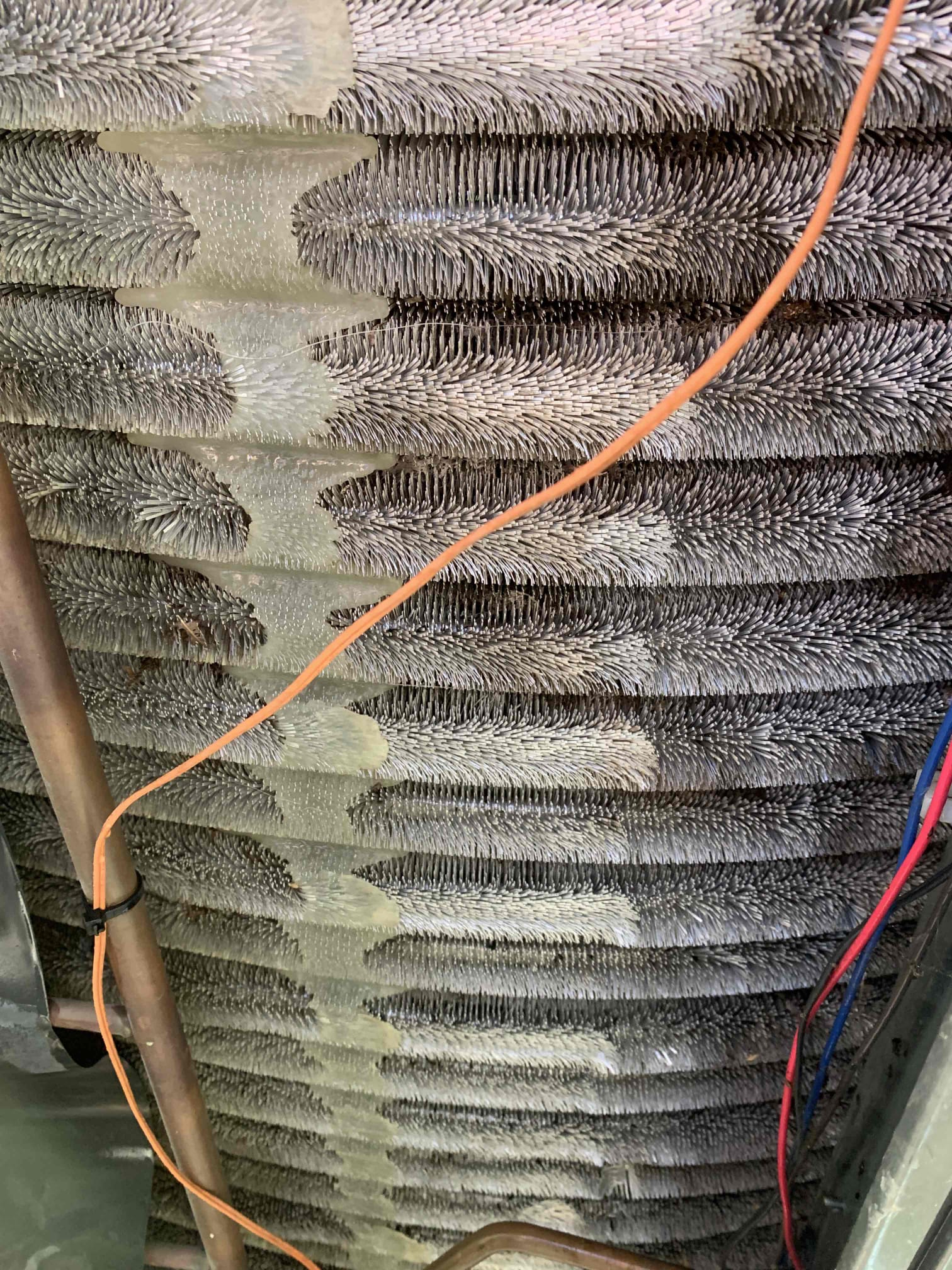 Upon completion of my thorough evaluation I found that the outdoor coil could benefit from having a deep cleaning done on it. By having it cleaned you can help the unit run at its peak performance and efficiency. I tested all electrical components on the inside unit. All tested within manufacturer specifications. Temperature being supplied to the home was 48 degrees, with 70 return. I treated and flushed the drain lines with water and total . I tested the run amps of both the compressor and fan. I found that hey are testing within manufacturer specifications. I did find that there is an error code on the thermostat stating that the suction line temperature sensor is not functioning correctly. Unit did not need to have filter changed at this time. 20x25x4 Aprilaire 210. Unit was cooling upon departure.