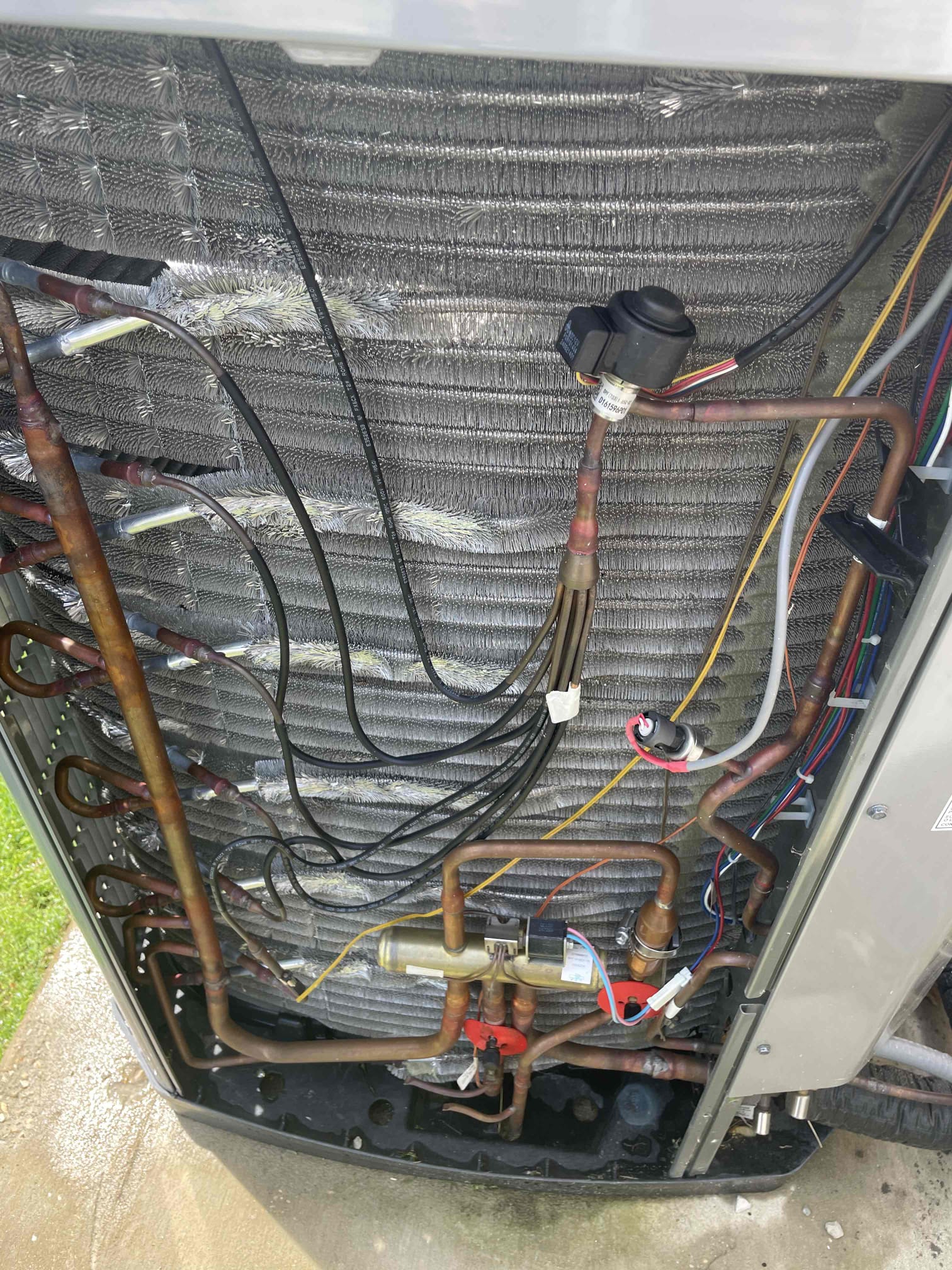 Frisco, TX - 1. Visually inspected condenser coil for leaks and abnormalities.
2. Inspected condenser fan motor, blades and bearings.
3. Inspected, cleaned, and, tightened wiring connections.
4. Measured capacitance of  compressor/fan motor capacitor.
5. Inspected and measured resistance of contactor
6. Measured compressor current draw.
7. Measured condenser fan motor amp draw.
8. Inspected and replaced return filter.
9. Inspected return plenum for dust or debris.
10. Inspected evaporator coil for cleanliness and oxidation.
11. Inspected blower motor/ blower wheel for dust and debris
12. Measured blower motor current draw.
13. Measured temperature differential from supply to return. 20 degrees measured.
14. Tested drain lines for proper drainage and treated to prevent blockages.
15. Rinsed condenser with water to promote heat exchange and reduce stress on system by removing dust and debris.

Found mitigation test mode error on thermostat history around February. Adjusted discharge air temp sensor t