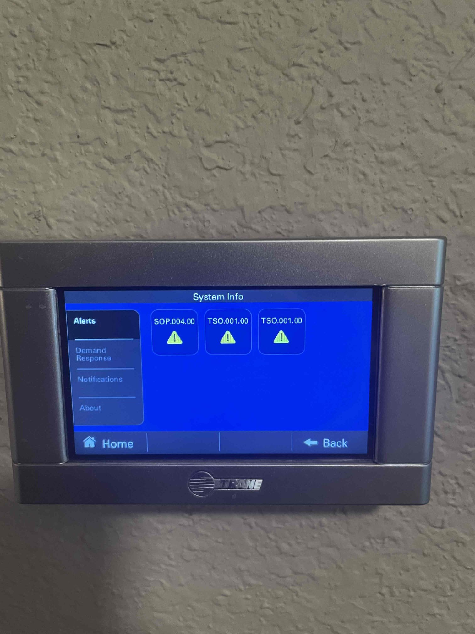 Van Alstyne, TX - Found errors on thermostat related to indoor temperature sensor. Replaced batteries on sensor and error went away. Tested capacitor on outdoor unit and found it to be entirely failed and bulging. Replaced capacitor under parts and labor warranty and unit started up without issue. Allowed unit to run for 30 minutes and tested supply temp 57 supply 75. Slightly higher than expected tested refrigerant pressures and found then to be within manufacturer specifications. Low temp split is likely due to very dirty outdoor coil. We will address this on next maintenance.

System running upon departures