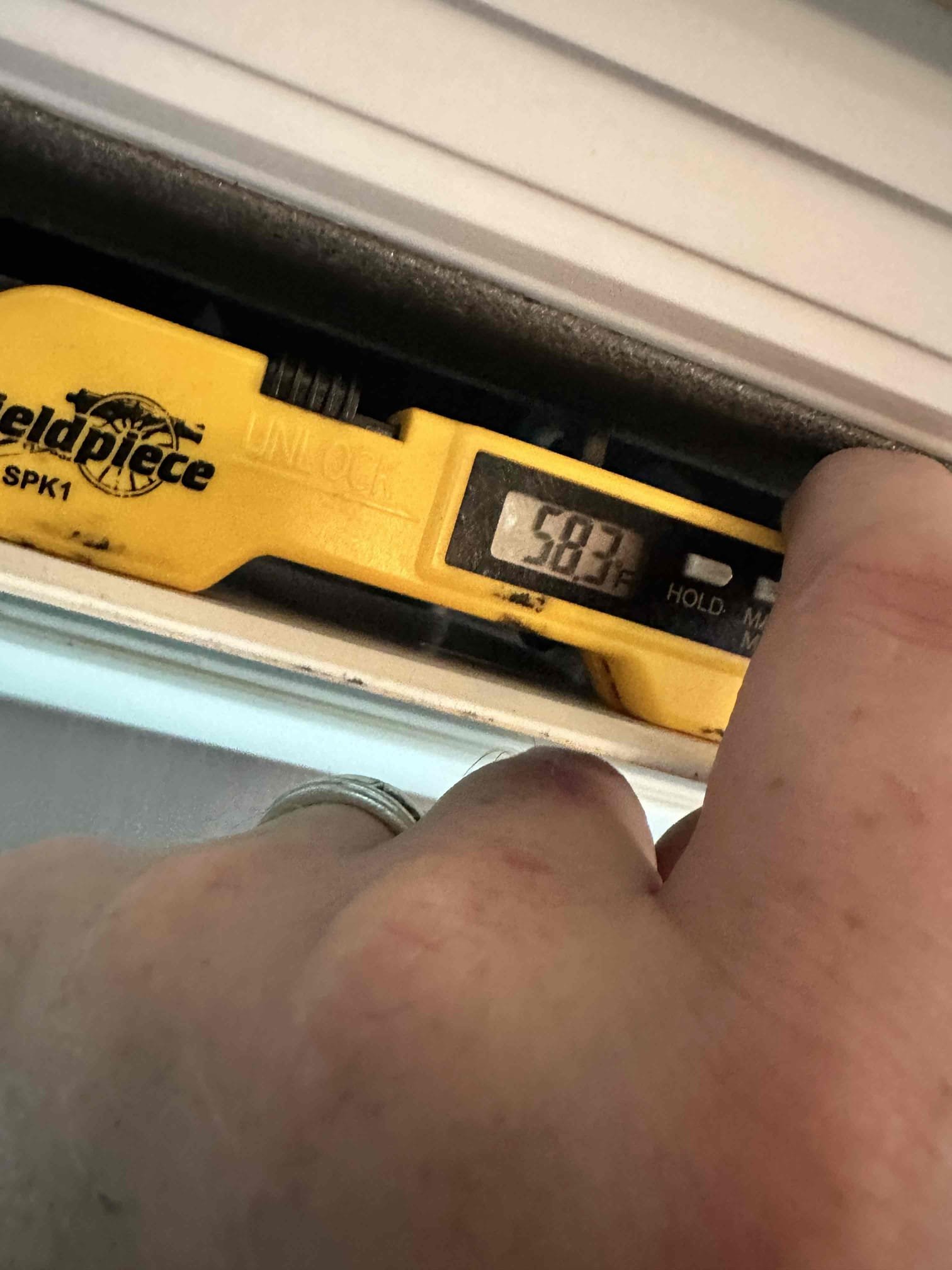 McKinney, TX - I performed a single cooling maintenance on a 2020 Daikin mini split. I thoroughly examined cleanliness, operation, drains, and electrical. During my drain testing, I discovered that the unit drips water from the bottom right corner when too much water is present. I quickly investigated and found that the drain pan is cracked. To properly address this, we need to remove the evaporator coil to replace the drain pan. Customer decided that it currently was not a big enough issue to proceed with a repair. I noticed that the equipment does not have surge protection. Mini splits are very susceptible to surge damage. I offered to install a surge protector at the time of service. 