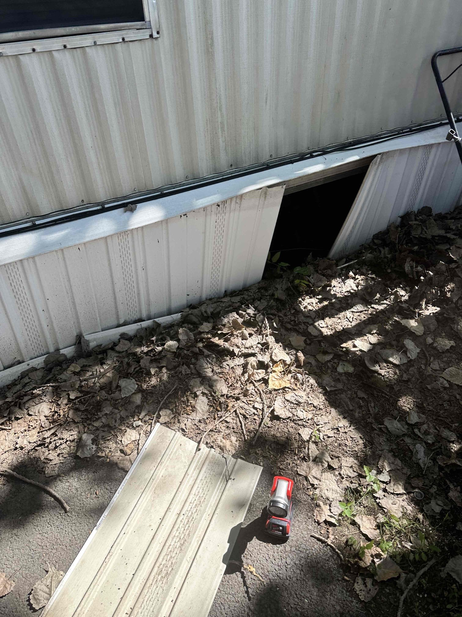 Sherman, TX - Upon arrival, the customer gave me more information on the water being in the pan. She stated that the water would over flow indicating that there is a clog present. I managed to locate the termination point under the house. After finding that, I was informed of an issue at the outdoor unit. The condenser fan motor is seized up. I presented pricing to address these issues at the time of service. 