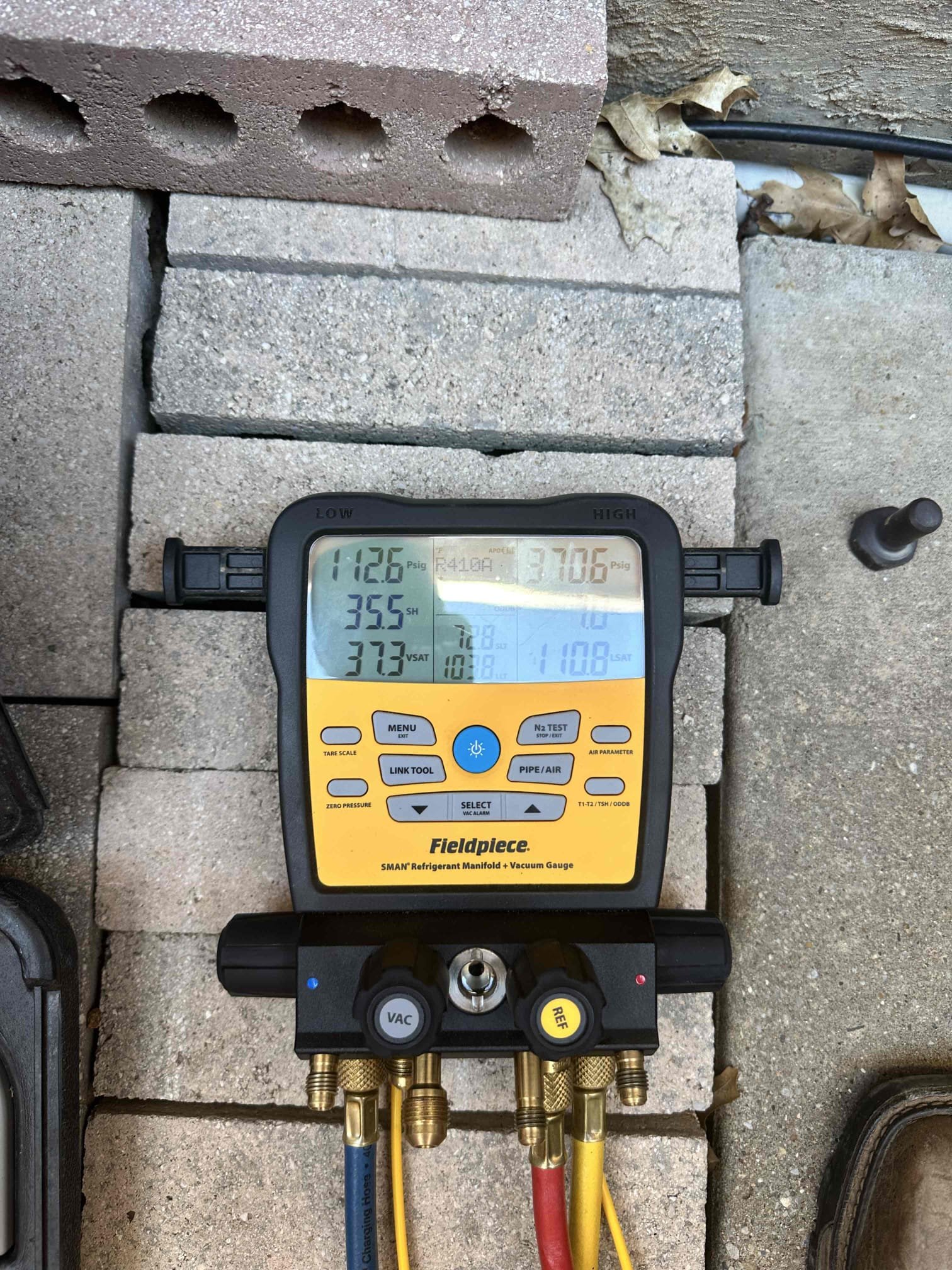 Anna, TX - Upon arrival, I observed that the outdoor suction line was not sweating at all. I proceeded to hook my gauges to the system and found the system to be low on R410a. After speaking with the customer, it was decided to get the system out of freezing but not fill it up. I got the temperature split to 15 degrees with 4 pounds of refrigerant per the customer’s request. System is somewhat cooling upon departure. 