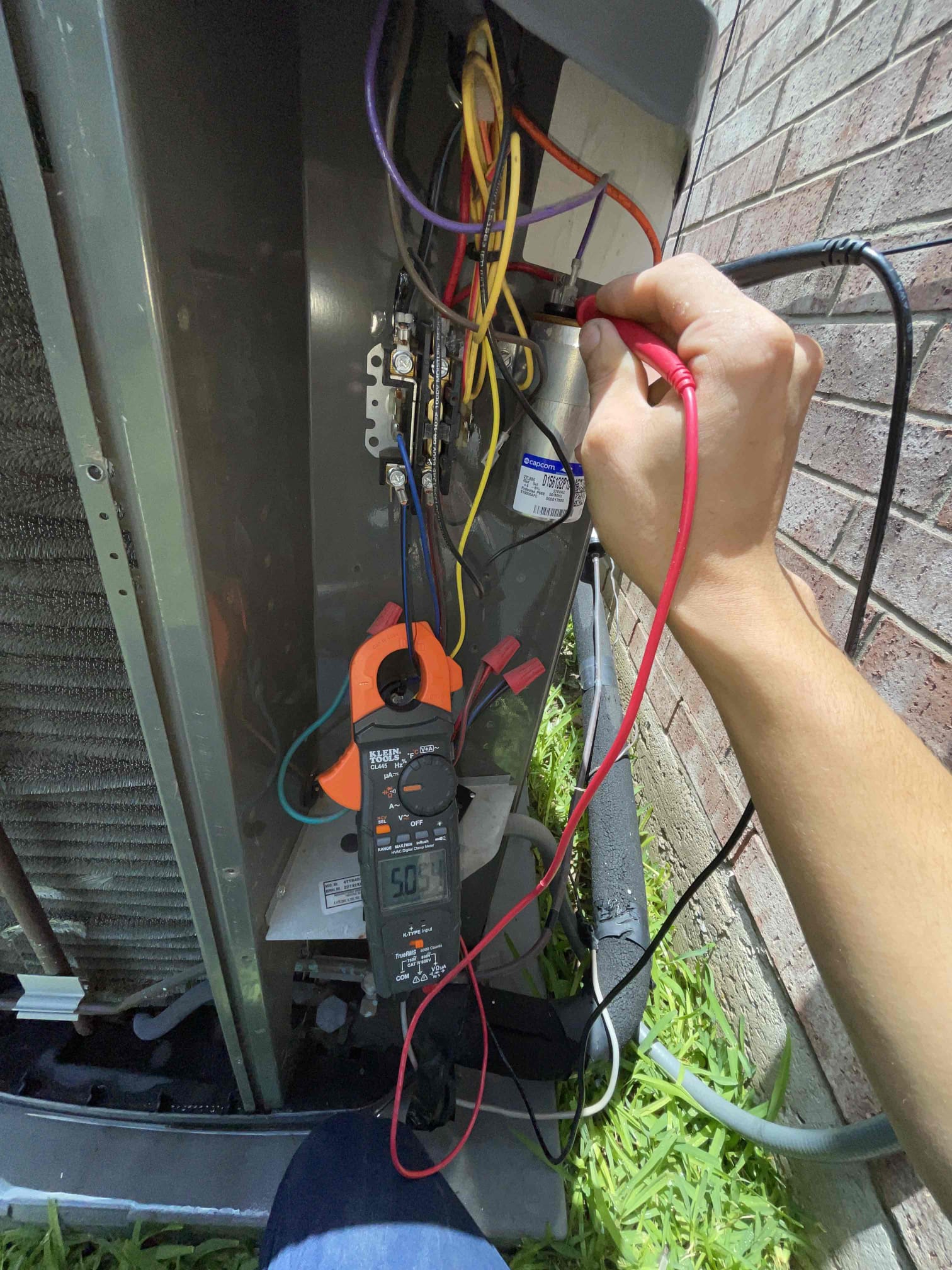 1. Visually inspected condenser coil for leaks and abnormalities.
2. Inspected condenser fan motor, blades and bearings.
3. Inspected, cleaned, and, tightened wiring connections.
4. Measured capacitance of  compressor/fan motor capacitor.
5. Inspected and measured resistance of contactor
6. Measured compressor current draw.
7. Measured condenser fan motor amp draw.
8. Inspected and replaced return filter.
9. Inspected return plenum for dust or debris.
10. Inspected evaporator coil for cleanliness and oxidation.
11. Inspected blower motor/ blower wheel for dust and debris
12. Measured blower motor current draw.
13. Measured temperature differential from supply to return. 20 degrees measured.
14. Tested drain lines for proper drainage and treated to prevent blockages.
15. Rinsed condenser with water to promote heat exchange and reduce stress on system by removing dust and debris.

Both contactors on outdoor unit are testing with high ohms, but with very little putting or burning of conta