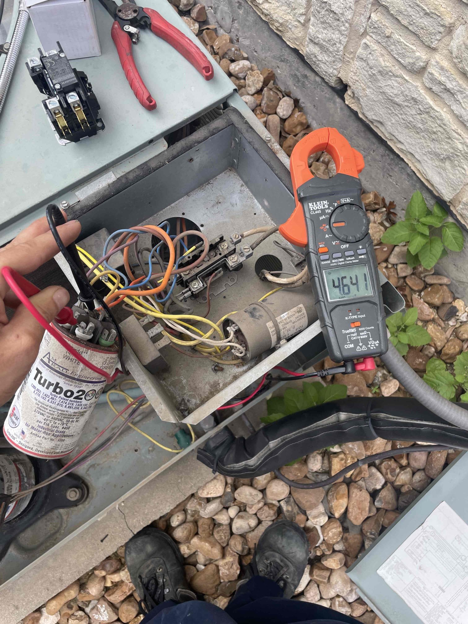 Frisco, TX - Arrived on site master bedroom unit was blowing air but not cooling. Found high pressure switch tripped. Reset and tested unit again. Unit came on and outdoor fan motor did not. Upon further testing it was found that the motor was seized. Adjusted capacitor terminal from 4mfd to 6mfd and added lubricant to motor shaft. With these adjustments I was able to get the motor moving again, but advised homeowner I cannot know for how long it will last. Advised replacing motor to avoid system failure. Spoke with manufacturer and they advised me it would take about a week to get the motor in from Arkansas. Homeowner elected to go forward with motor replacement. Advised we would order motor as soon as possible and update her with more information as soon as we have more. 

Also replaced thermostat with programmable Honeywell. Programmed thermostat to system speciations. Homeowner advised me they would like to set up the time blocks and set points themselves. 

System running upon departure.

