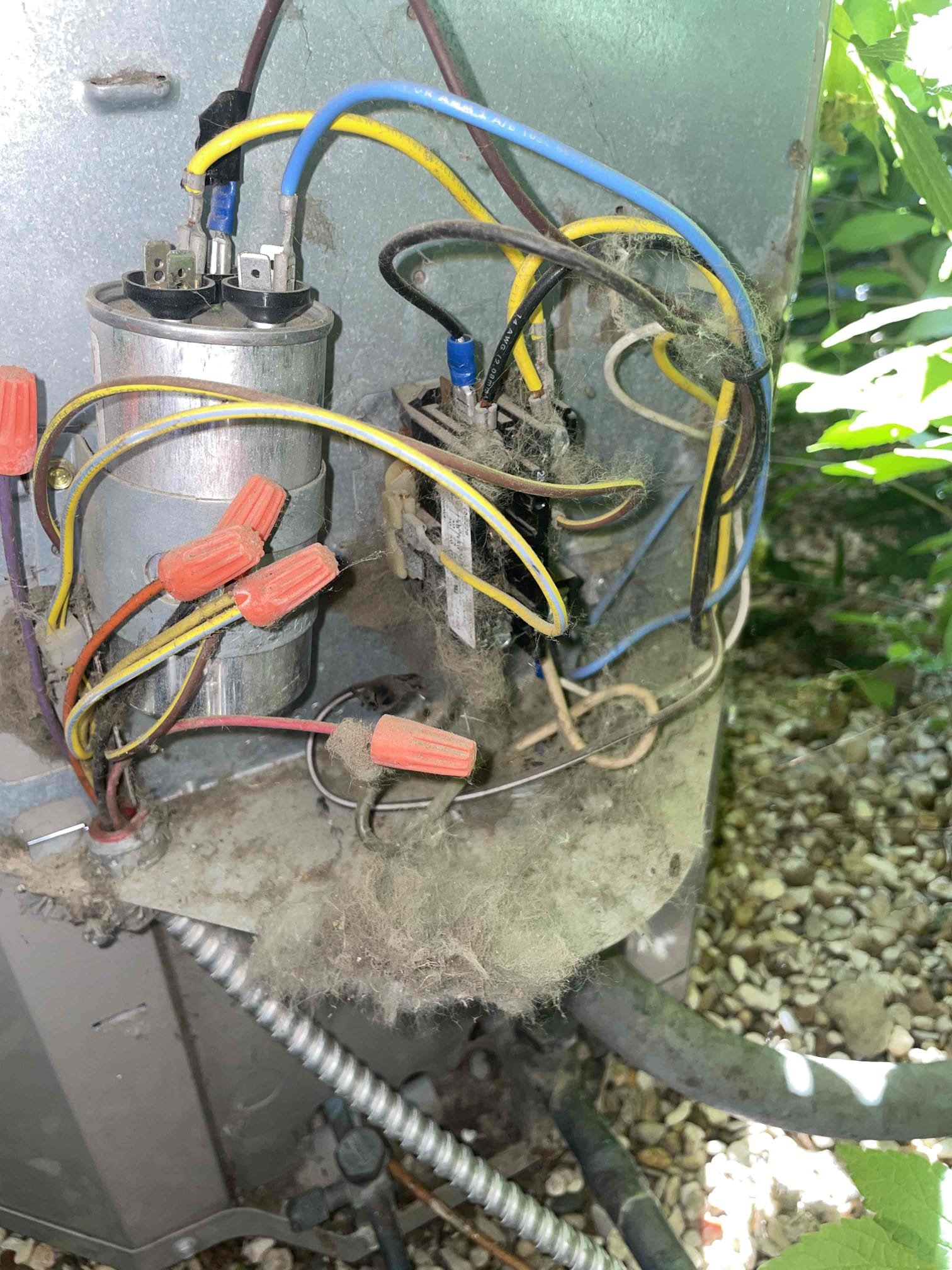 Arrived on site, tenets wanted me to replace thermostat with customer provided thermostat. Customer stated high voltage breaker was tripped. Checked voltage at thermostat to verify the thermostat was bad and found no voltage. Found light switch to furnace turned off. Flipped switch back on and blower came on with out issue and thermostat was providing a cooling call to outdoor contactor. At the outdoor unit I found the capacitor was wired wrong and the after market fan motor was spinning backwards. Condenser was also completely blanketed in cottonwood. Provided estimates for condenser cleaning and wiring repair. Performed wiring repair and tested unit cam on without issue and fan motor was now blowing out the top of the unit. Tenet washed the condenser themselves while I was on site. Measured refrigerant pressures and found them to be low. Advised homeowner that we no longer carry R22 refrigerant and they would need to find someone else to correct the charge.  Measured 23 degree split 