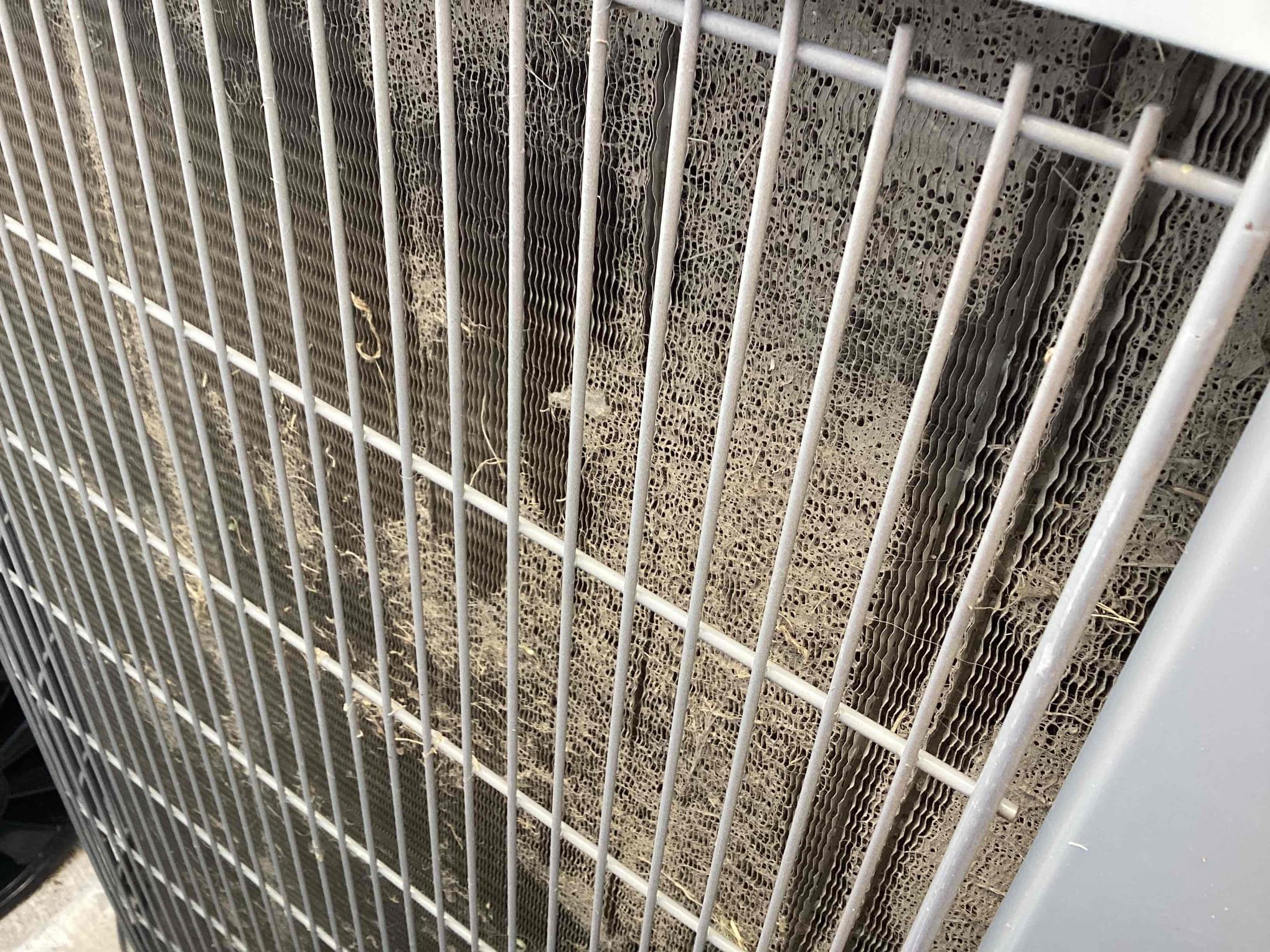 Van Alstyne, TX - Upon arrival I found that downstairs zone damper was closed. I manually opened it so that downstairs could get some airflow. Downstairs zone damper motor was bad. Need to order and replace also found evaporator coil about half frozen due to insufficient airflow and outdoor condenser coils were extremely dirty and needs cleaning left estimate for landlord to clean condenser coils. He opted to clean condenser coils himself. I did leave disconnect turned off outside, so that unit would not continue to freeze. I did use my shop vac to vacuum out all of the water that had collected in the return duct underneath the evaporator coil and tenants provided me with a towel to help soak up some of the water on the plywood inside the return cavity. Landlord said that he would give us a call in the morning if he would like to proceed with ordering the zone damper motor. 