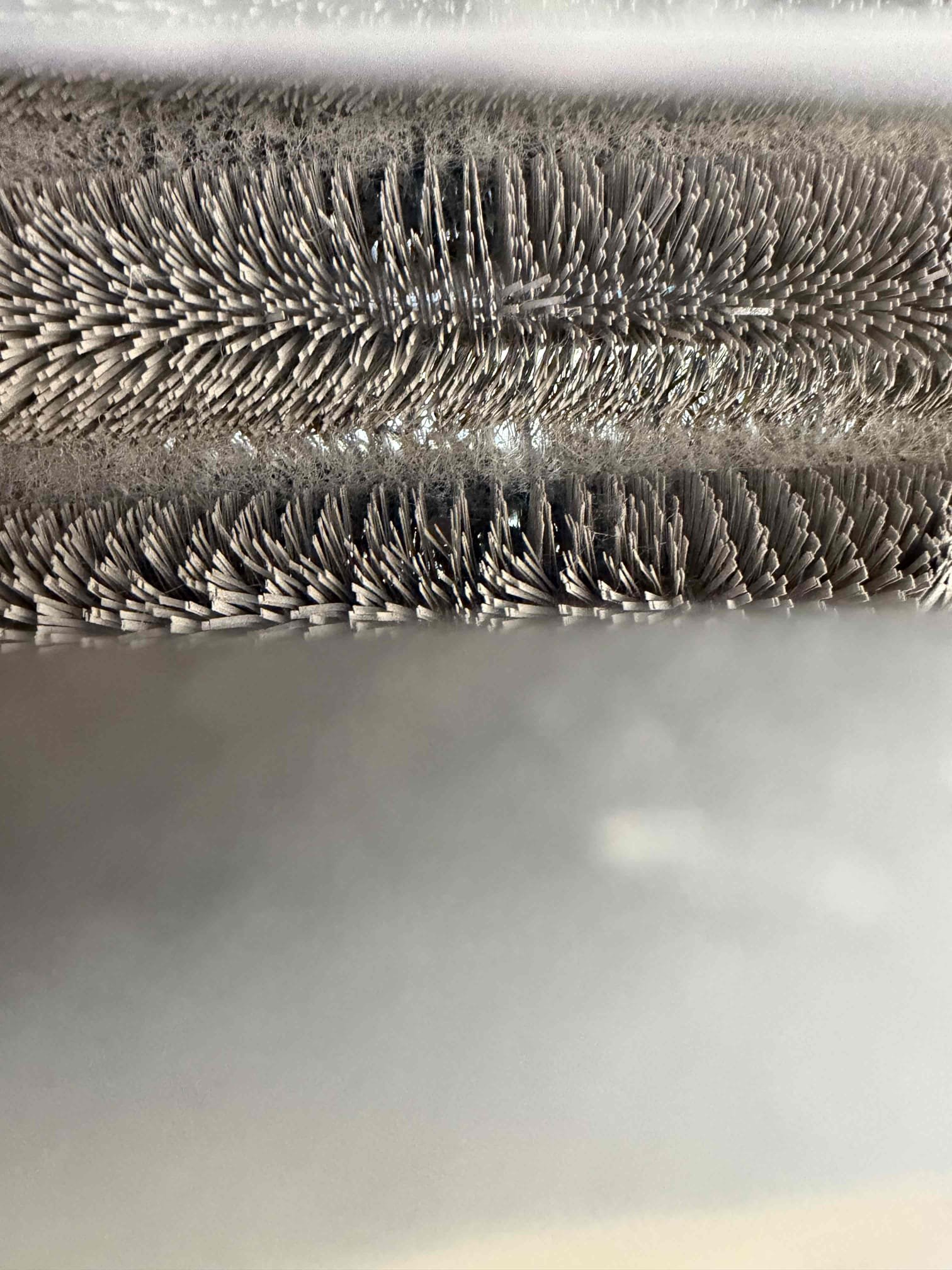 Anna, TX - Upon arrival, I invested the cleanliness of the indoor and outdoor systems. The high pitch noise is from the ECM module on the outdoor fan motor. This noise is from the hertz of the module. This noise can become louder the more strain on the motor. The ducts have a reasonable amount of sheet rock duct present. I investigated the drain to look for signs of sheet rock dust coming out. The drain had a sheet rock slurry in the ptrap. The drain will end up clogging and is more susceptible during the heating season. The sheet rock in the drain tells me that the evaporator coil has it in it. This leaves the system at risk of freezing up and causing potential water damage. I presented pricing for minimal advised repairs, all levels of duct cleaning, and maintenance membership. 