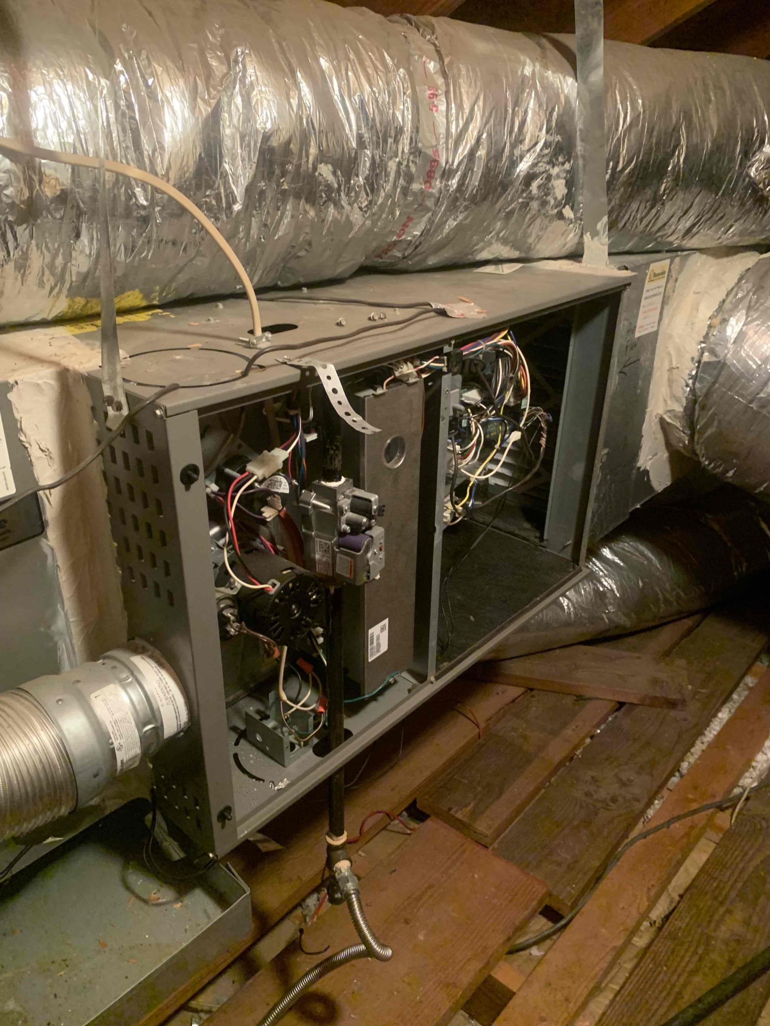 Customer stated that system was not keeping up with thermostat during the middle of the day. Went to check temperature split and found that furnace door was left off during our last visit. This was bringing in attic air to the system. No charge. System is cooling at this time. 