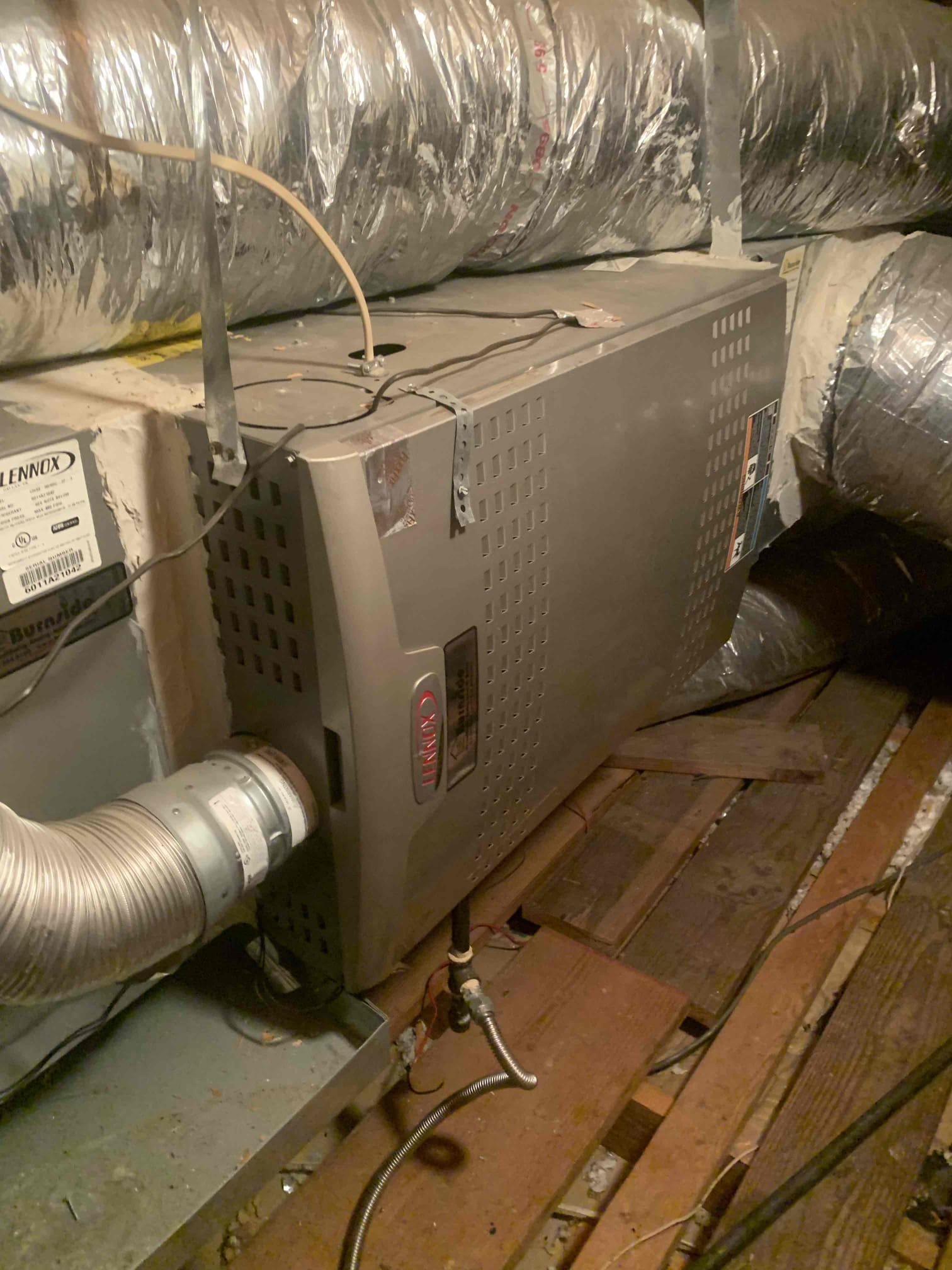 Customer stated that system was not keeping up with thermostat during the middle of the day. Went to check temperature split and found that furnace door was left off during our last visit. This was bringing in attic air to the system. No charge. System is cooling at this time. 