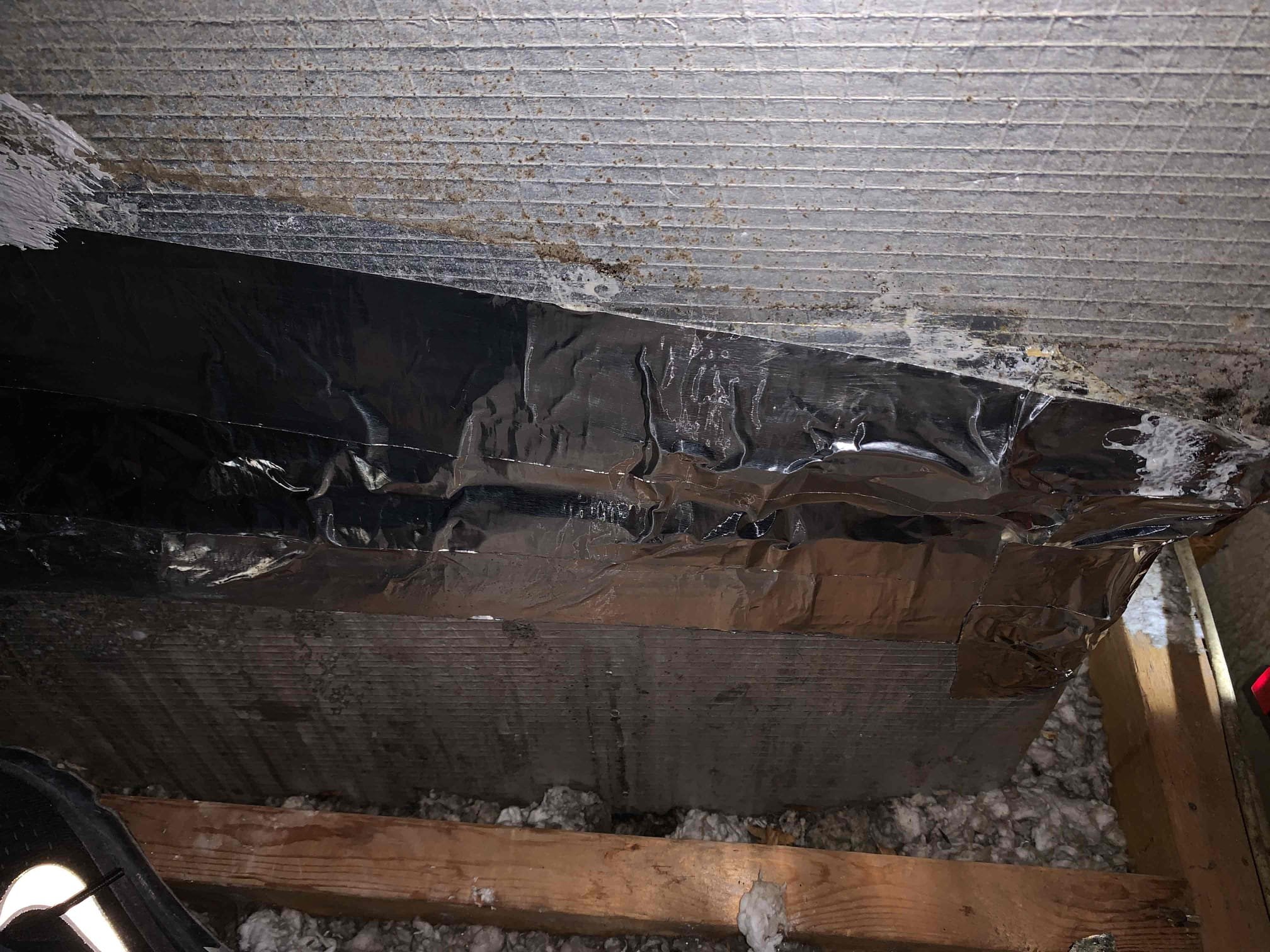 Customer had concerns about uneven cooling in the house. Checked supply temperture and it was 52°. Went into attic and checked ductwork. Found 1 duct completely disconnected at the Y going into the living room. The other duct going into the living room had over a foot of insulation missing. Found another duct run missing over a foot of insulation as well. Notice a ton of air leaking from plenum connection into the attic, the tape had almost come off all the way. Insulation in attic is below the rafters, this makes it easy for hot attic air temps to seep into the living space. 

Customer approved repairs to reattaching the ductwork and getting flex fully covered with the insulation. Also sealing around the plenum connection in the attic with tape and air mastic. 