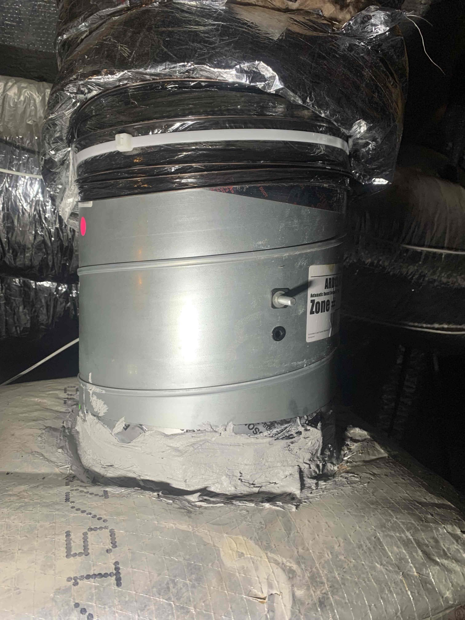 Removed old damper motor for upstairs zone. Removed actually damper from plenum and flipped it over to have it pointing the correct direction. Sealed around damper and re-insulated it. Installed new damper motor. Tested operation with damper closed and open. System is cooling at this time. 