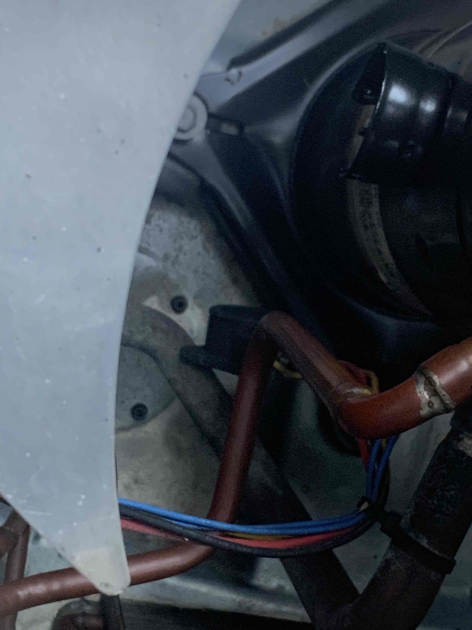 No cool on upstairs system. Indoor blower was running. Customer said breaker tripped yesterday, and when he reset it heard a loud pop. Went outside to condenser and found that compressor plug had been blown out of it. Compressor needs to be replaced along with power plug going into it. 