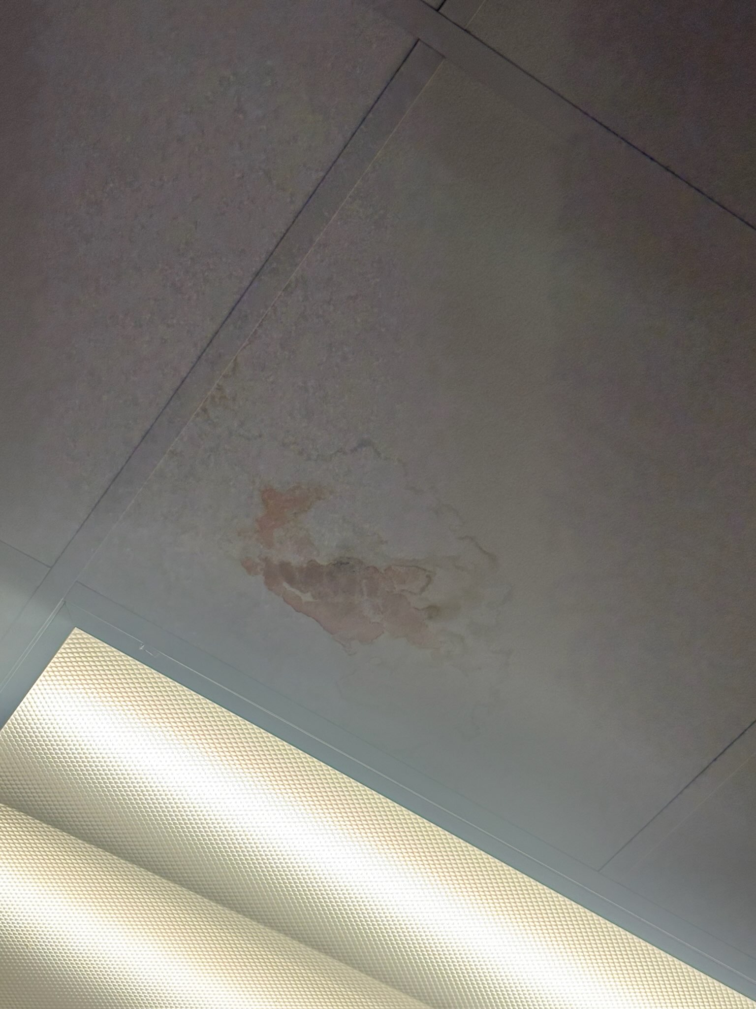 Melissa, TX - Upon arrival, I found that the suction line going to air handler number six had about 12 inches of armor flex missing on it. This was causing condensation to build up and then drip down the armor flex and onto the ceiling. See videos.

I re-insulated suction line and tested drain line, drain line is clear. I also tested safety switch on condensate line, it is functional.

System is running properly at this time, and re-insulating that suction line should stop any further water damage to the ceiling.