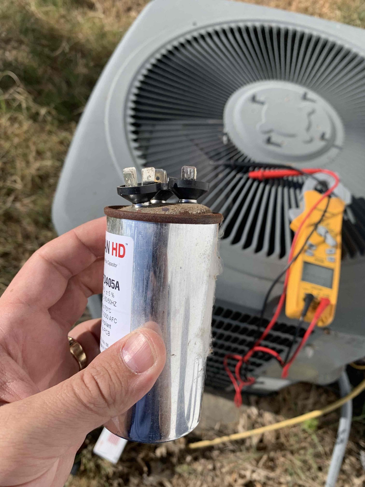Anna, TX - No cool on east side system. Customer noticed that condenser was making a humming sound when it was trying to run. Checked capacitor and it was completely dead. Replaced 40/5 capacitor and tested system after repair. Measured amp draw on on compressor and condenser fan motor. Contactor is still in good condition. Checked supply temperature at floor grill. System is cooling at this time. 