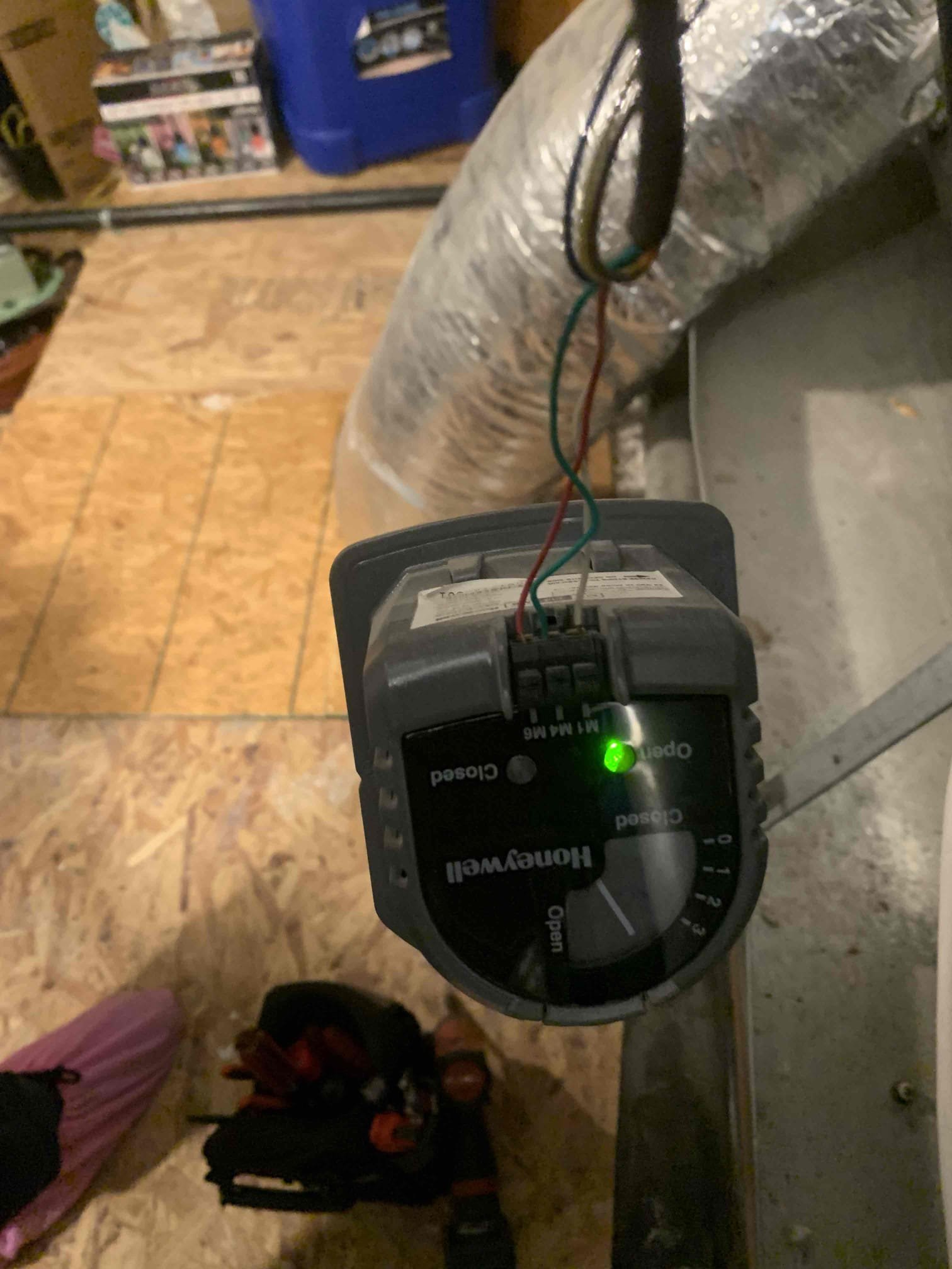 Anna, TX - Customer was having concerns about upstairs zone not cooling off. Downstairs zone is cooling correctly and getting to temperature but upstairs keeps getting hotter. Upstairs thermostat was set to cool. Zone damper for upstairs is closed when it is supposed to be open. Tried opening it with pin, but motor is locked up. Removed motor and manually opened damper to allow upstairs zone to cool temporarily until we can come back and replace motor. 
