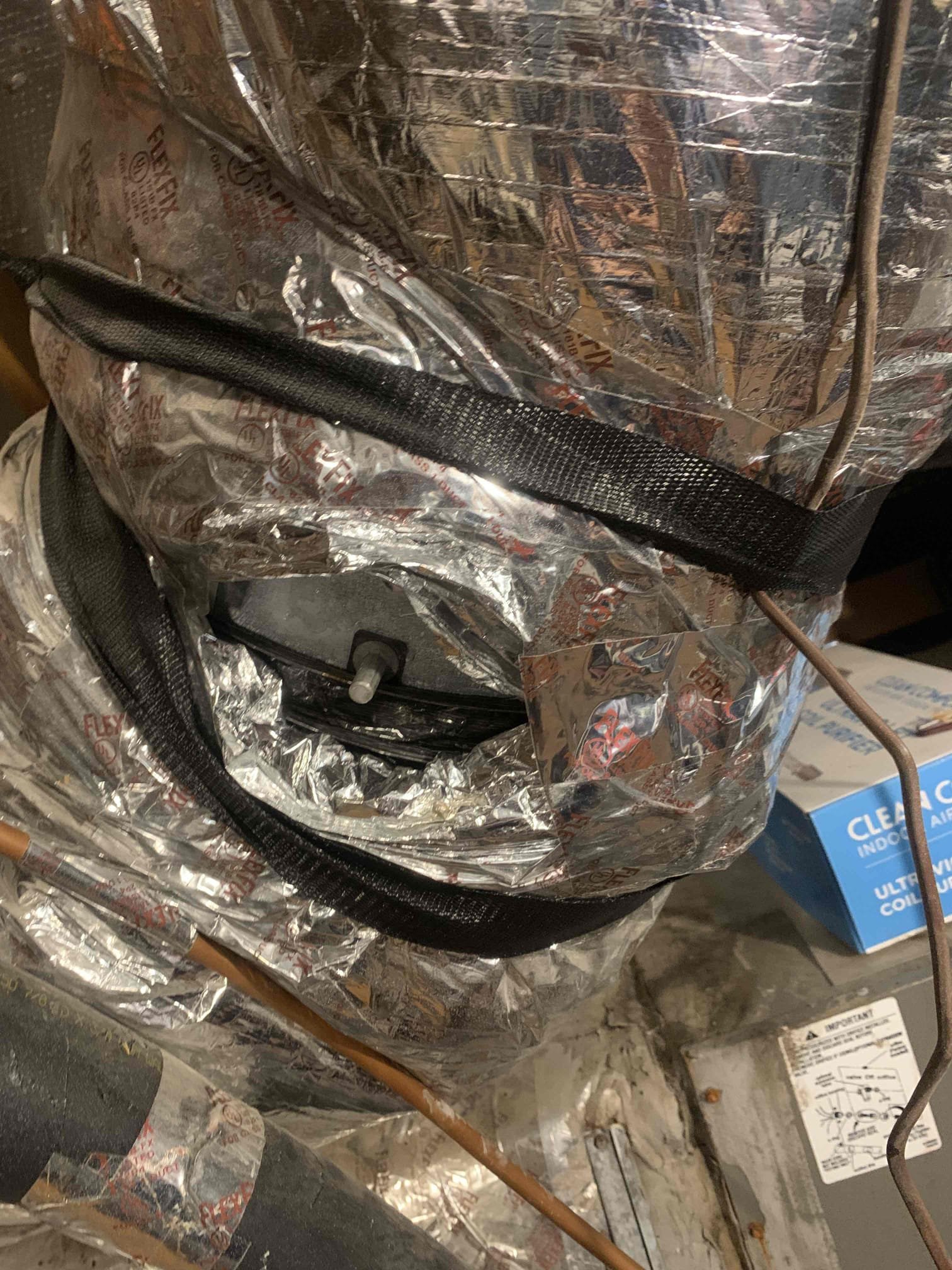 Anna, TX - Customer was having concerns about upstairs zone not cooling off. Downstairs zone is cooling correctly and getting to temperature but upstairs keeps getting hotter. Upstairs thermostat was set to cool. Zone damper for upstairs is closed when it is supposed to be open. Tried opening it with pin, but motor is locked up. Removed motor and manually opened damper to allow upstairs zone to cool temporarily until we can come back and replace motor. 