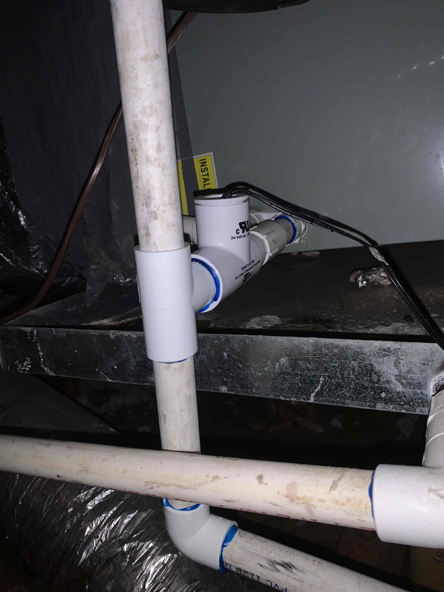 Anna, TX - Customer was having issues with water dripping outside from secondary drain line. Primary drain line is clogged up and causing water to drip into secondary drain pan. Cleared drain line using nitrogen and poured water down it to verify it was clear. 

Customer also had concerns about downstairs not getting cold like upstairs is when they are set on the same temperature. Single zoned system. Found that damper motor for downstairs was stuck closed and would not open. Was able to get it forced open but it will need to be replaced to function properly. System is cooling at this time. 