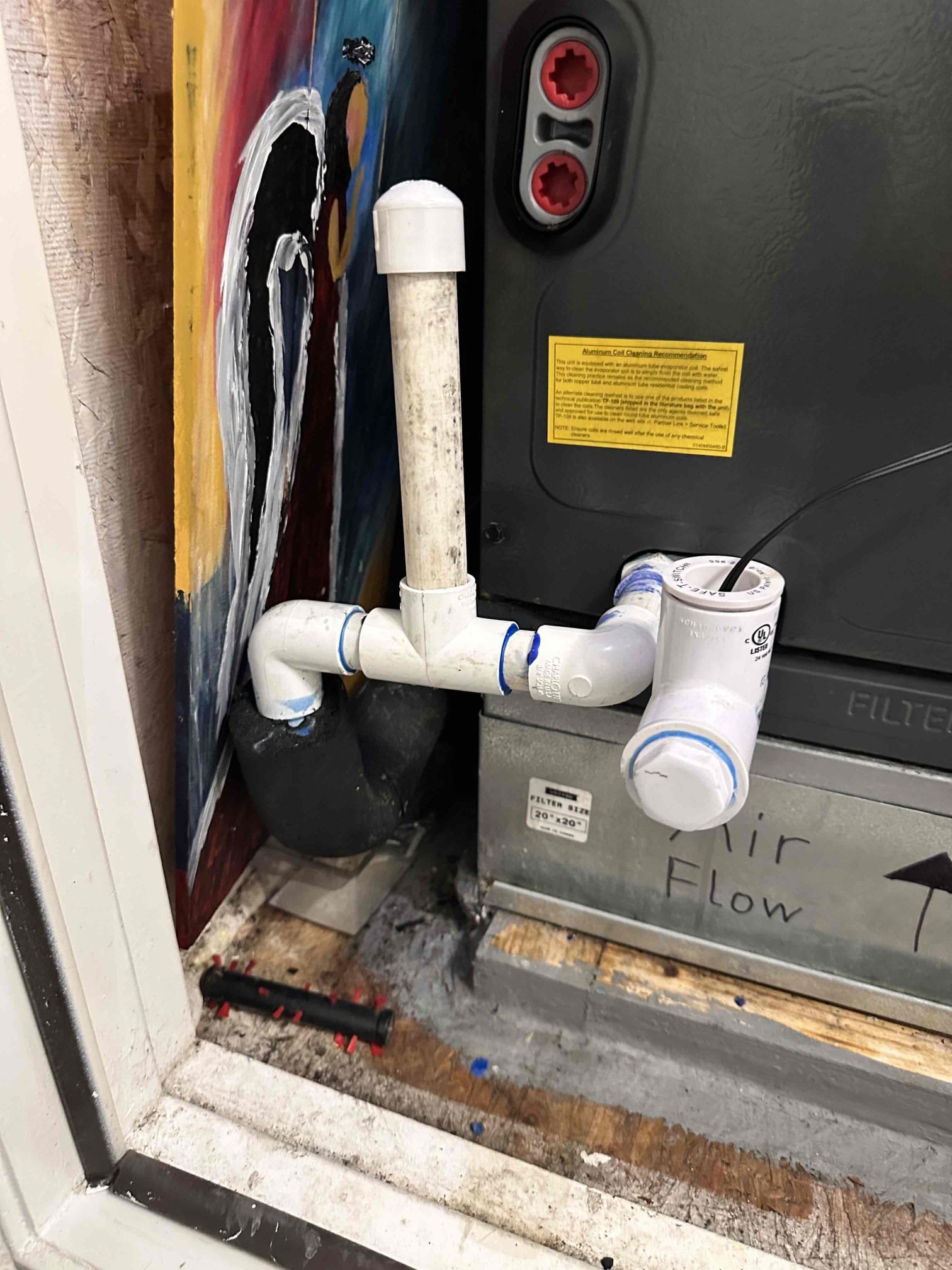 Anna, TX - Return for system not cooling again. On arrival, outside unit was running but indoor blower was not, coil was frozen. Error code was for clogged drain line. Once I pulled float switch out, the blower came back on. The primary drain line is clogged up. When the float switch would trigger, it was only shutting the blower off but keeping the condenser running. This is what caused it to ice up. Cleared drain line using nitrogen. Poured water down it to verify it was clear. Wired float switch up to shut off the thermostat completely. This will shut everything off rather than only the blower. Tested float switch operation as well. System is cooling at this time and drain is clear. 
