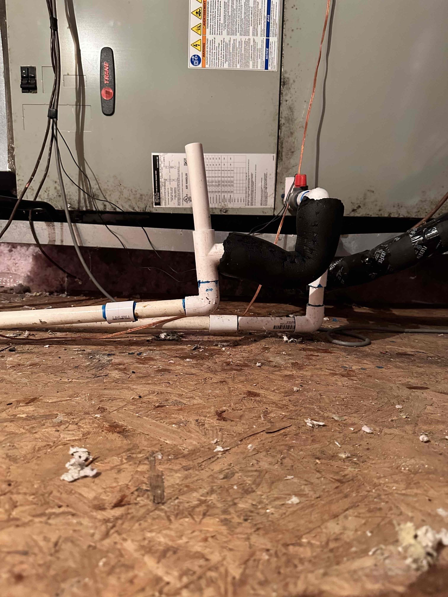 Wylie, TX - Arrive for excess water in the drain pan. Found that primary drain line is clogged and water was overflowing into the secondary pan. Cut drain and cleared it with water hose. Vacuumed out drain to float switch. Glued everything back together and poured water down it to verify it was clear. 

Customer had concerns about secondary draining out to their back patio where there is furniture. Suggested moving it to the side of the house instead. Access is good but I did warn the customer we will have to move the new insulation around to get the drain line ran to the soffit. Let her know that we will put it back as well as we can but it will have to get moved around. Sending an estimate. 