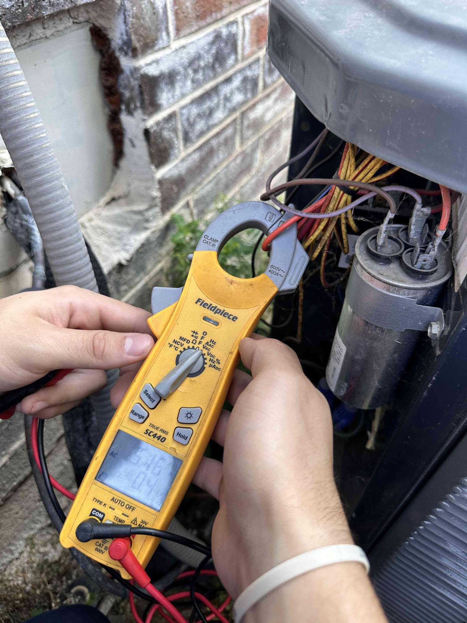 Customer had concerns about condenser making loud noise. He noticed yesterday that unit serving the bedroom system was making loud noise, he turned it off immediately. He later learned that they had a brown out and it had affected the power. Once he turned system back on it stopped making the loud noise. We checked out the system. Measured amp draw on compressor and fan motor. Capacitor was out of range, customer approved replacement of it. Tested system after repair. System is cooling at this time. 