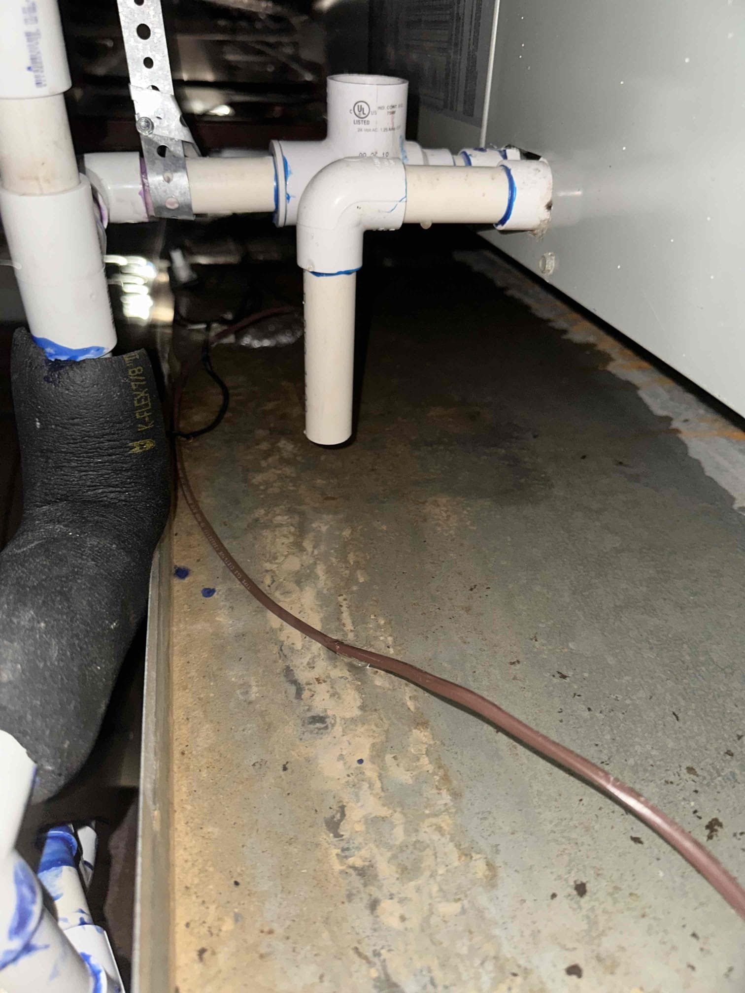 Sherman, TX - System #4 thermostat was blank. After inspecting unit found that primary drain line was clogged and float switch shut unit down. Blew out drain line using nitrogen and vacuumed out extra buildup that was present. Poured water down drain line to verify it was clear. Treated primary drain pan using algae guard strip. System came back on and system is cooling at this time. 