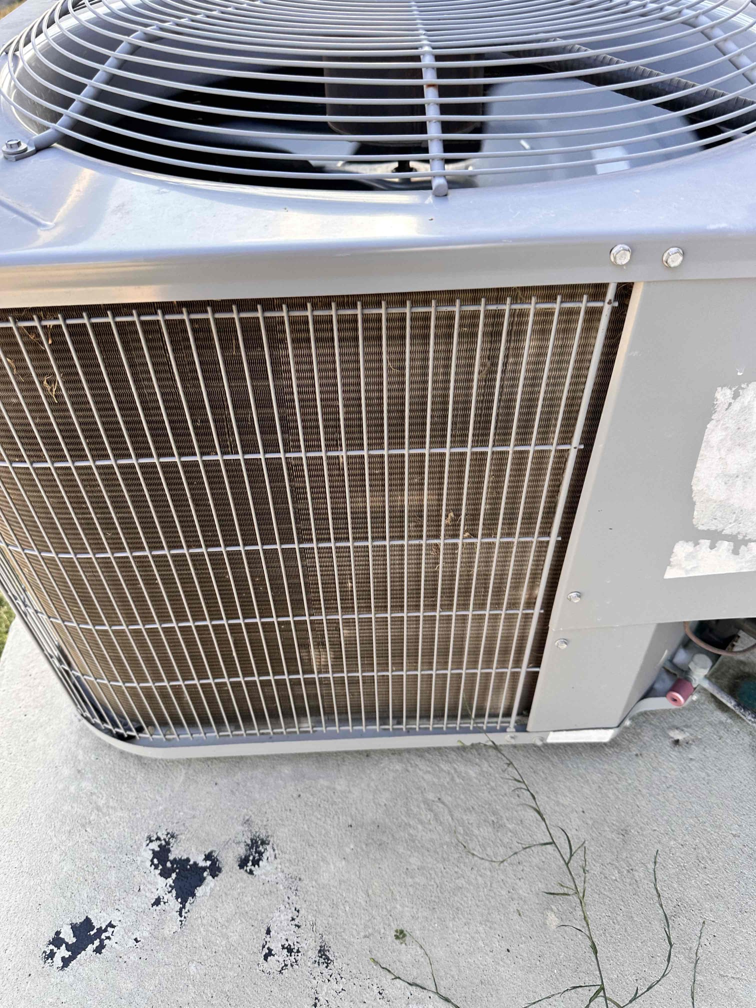 Farmersville, TX - 1 system AC maintenance. Replaced filter provided by tenant. Set thermostat to cool and tested temperature drop across system. Verified drain lines are clear and treated them with drain solution. Return plenum and ductwork are very dirty. The debris and dirt are building up on the evaporator coil as well which is causing the system to work harder. This will lead to poor performance from the unit as well as drain issues. Recommend having indoor system and ductwork cleaned. Next, went outside to condenser. Measured amp draw on compressor and fan motor. Starting amp draw on condenser is over the limit, recommend installing hard start kit to prolong the life of the compressor. Checked capacitor and contactor, they are both good. Cleaned condenser coil using water. System is cooling at this time. 
