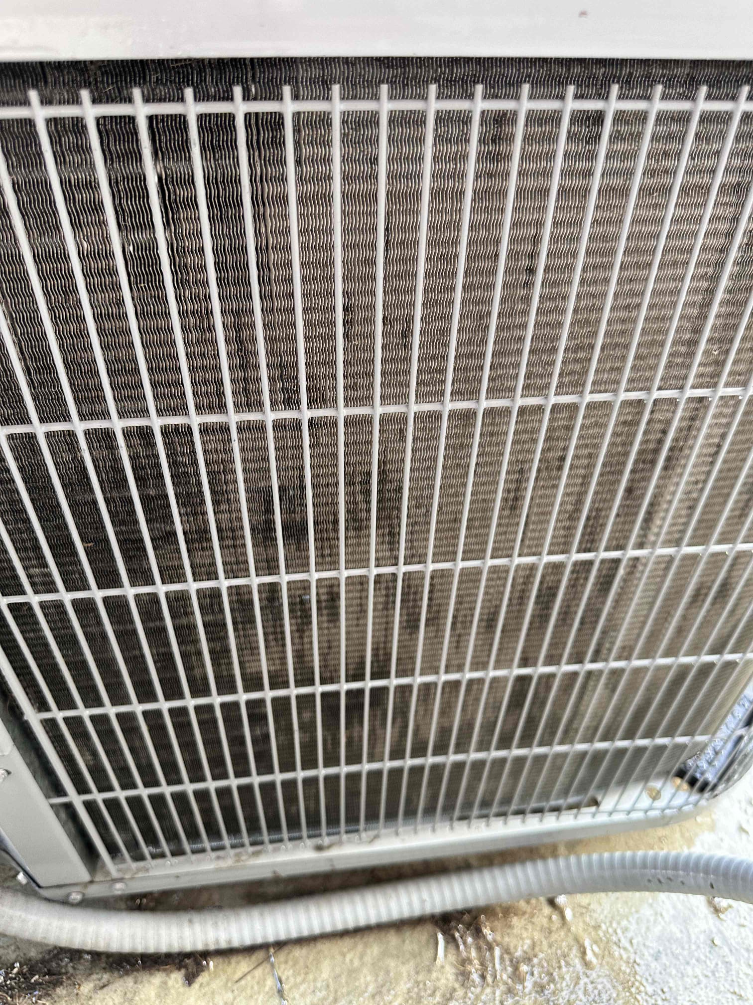Farmersville, TX - 1 system AC maintenance. Replaced filter provided by tenant. Set thermostat to cool and tested temperature drop across system. Verified drain lines are clear and treated them with drain solution. Return plenum and ductwork are very dirty. The debris and dirt are building up on the evaporator coil as well which is causing the system to work harder. This will lead to poor performance from the unit as well as drain issues. Recommend having indoor system and ductwork cleaned. Next, went outside to condenser. Measured amp draw on compressor and fan motor. Starting amp draw on condenser is over the limit, recommend installing hard start kit to prolong the life of the compressor. Checked capacitor and contactor, they are both good. Cleaned condenser coil using water. System is cooling at this time. 