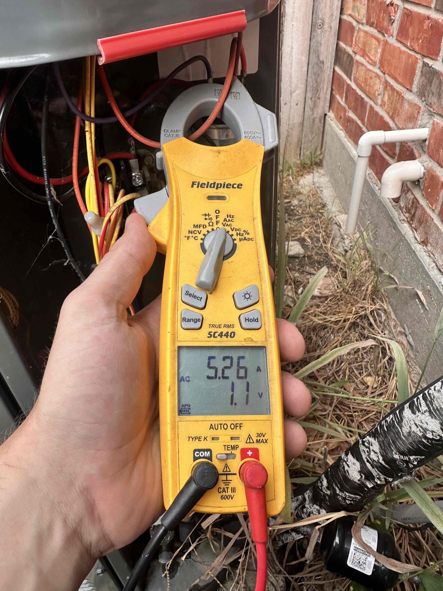 1 system AC maintenance. Replaced filter in grill provided by customer. Measured temperature drop across system, 75° return and 56° supply. Checked operation of drain line and treated it with drain solution. Drain pan has safety shut off switch. Next, went outside to condenser. Measured amp draw on compressor and fan motor. Capacitor that runs the outside unit is very low and could fail at any point. Condenser coil is completely caked in dirt. We cleaned it the best we could without removing panels but it needs a deeper clean. Customer needs to wait a couple weeks to have repairs done. We will follow up next month. System is cooling at this time. 