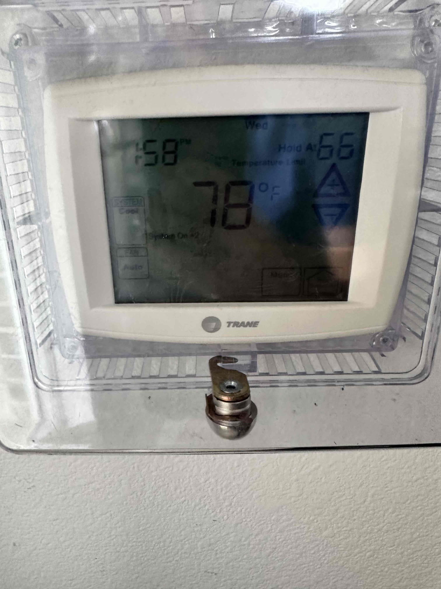 No cool on gym system. Thermostat was set to cool but condenser was not running. Went into attic and found that primary drain line was clogged. P-trap was blocked up by algae from the coil. Blew drain line out using nitrogen and poured hot water down line after to wash all stuff out. System is draining properly now. System is cooling at this time. 
