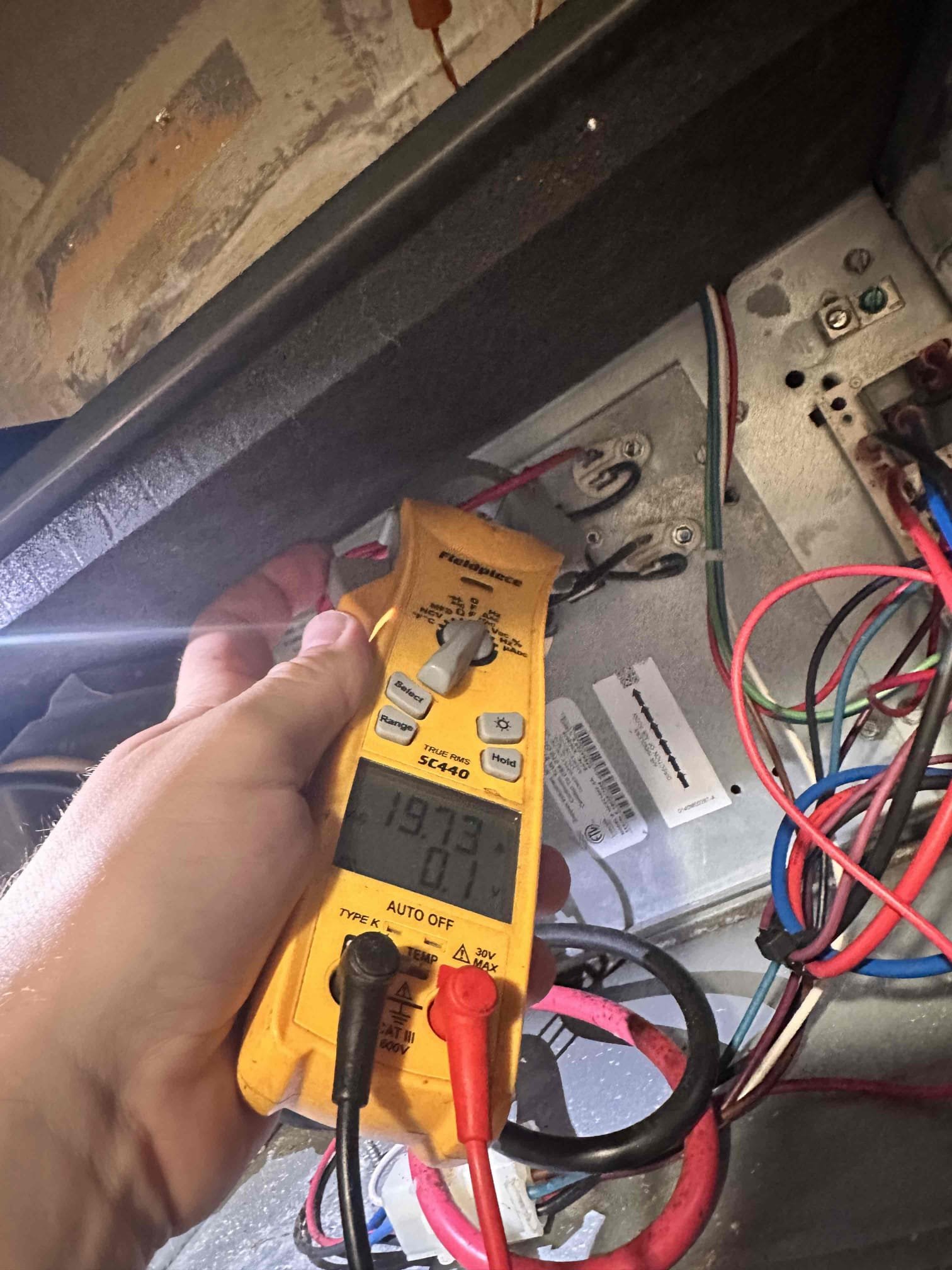 Weston, TX - 1 system heating maintenance. Air handler with electric heating only. Measured amp draw on blower motor. Blower motor has quite a bit of buildup on it which will wear out the motor much quicker. Evaporator coil also has a lot of biological growth which affects the performance and efficiency of the system. Measured amp draw on heat strips, both are working properly. Checked temperature rise across system, 77° return and 112° supply. 

AC was not working on arrival. Found that breaker for outside unit was tripped. Checked compressor and it is not grounded. Reset breaker and condenser came on and started cooling. Measured amp draw on compressor and it is within acceptable range. System is cooling at this time. 

Performed indoor coil cleaning using foaming coil cleaner. Ran jetter through coil after to break down growth on coil. Cleaned drain pan as well as surface of coil.