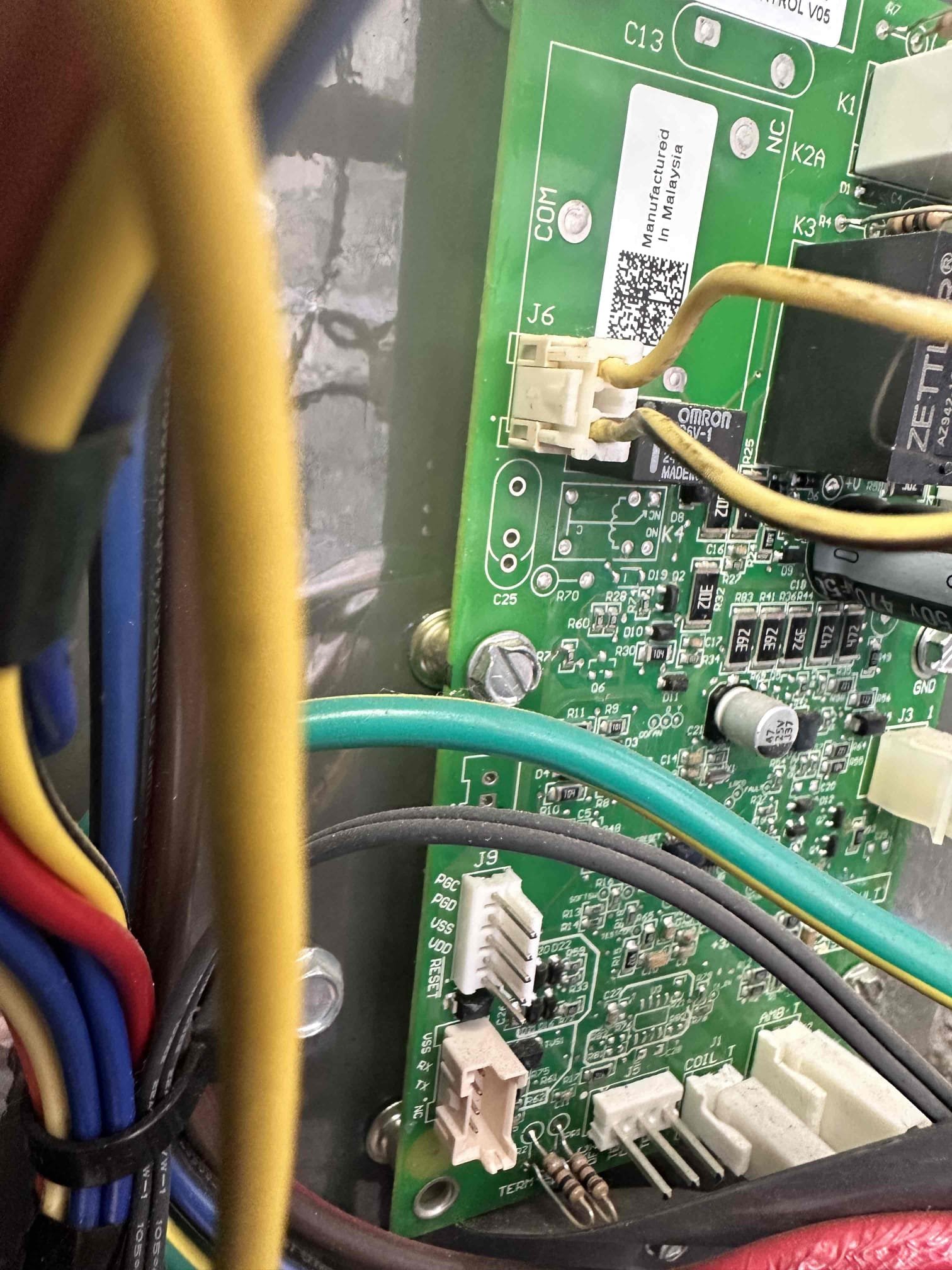 Denison, TX - Arrive for no Cool. Customer stated that outdoor unit would run for a bit and then shut off. Set thermostat to cool and everything came on like normal. Check temperature drop and getting 19° difference. Customer then said he noticed that the fan would stop while the compressor was still running. Took panel off and checked wiring for fan motor. I moved it around and fan stopped suddenly and then came back on. Found that flood going into defrost board had a wire that came loose. The pin on the board was not straight and was causing the wire to pop out of the plug. Fixed pin on board and also secured wire inside plug. Checked tightness of wire and it seems to be solid now. Tested system after repair and fan motor is operating correctly. System is cooling at this time.