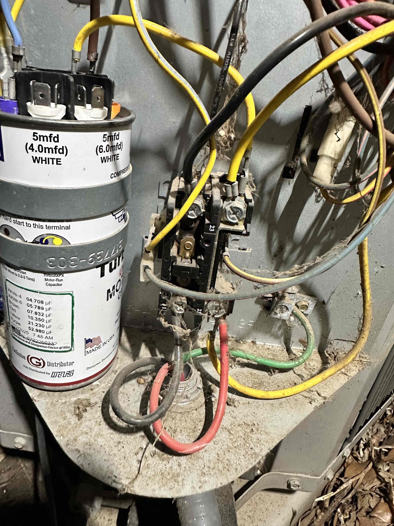 Sherman, TX - Arrive for no Cool on single system home. Thermostat was set to cool, indoor blower was running but condenser was not. Checked voltage at condenser, getting 240 from disconnect. There is not 24 V going to contactor. Checked wiring, going to unit and found it had broken as it goes into the cabinet. Cut and reconnected broken wires. Contactor was heavily pitted and very black, customer approved replacement. After replacing contactor and fixing broken wires, tested system in cooling. Condenser came on and is running. Measure temperature coming from supply, getting 64°. System is cooling at this time. 