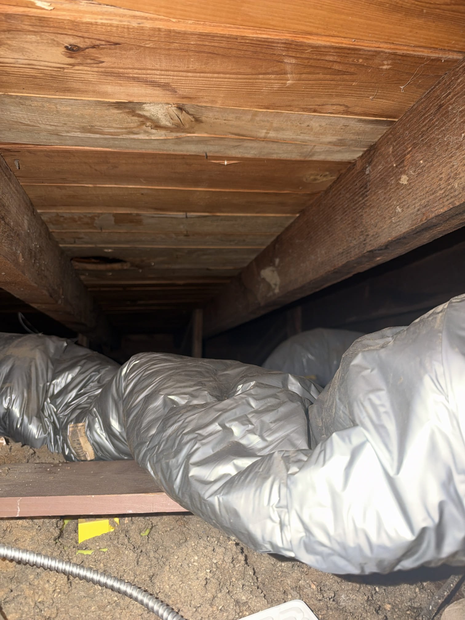Denison, TX - Management reported that the two front rooms, including the nursery and the small children’s room, were experiencing elevated temperatures throughout the day.

Upon inspection, the nursery room’s ductwork was found to be torn in the attic, resulting in insufficient airflow to the room. The ductwork serving the small children’s room was also inspected, and no airflow was detected.

Recommendations:

* Replace the damaged ductwork serving the nursery.
* Replace the ductwork serving the small children’s room to restore proper airflow.
* Install dampers within the system to allow for better airflow adjustment and more even air distribution throughout the front portion of the building.

At the time of inspection, the HVAC system was operating and cooling properly. However, the identified ductwork issues are restricting airflow to the affected rooms and should be addressed to improve comfort and temperature consistency.

An estimate outlining the recommended repairs has been emailed to Mr. R