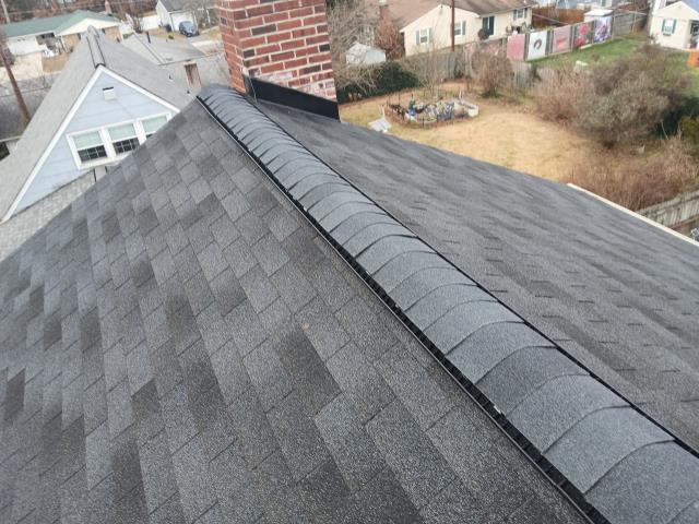 Installing a new ridge vent across the entire house