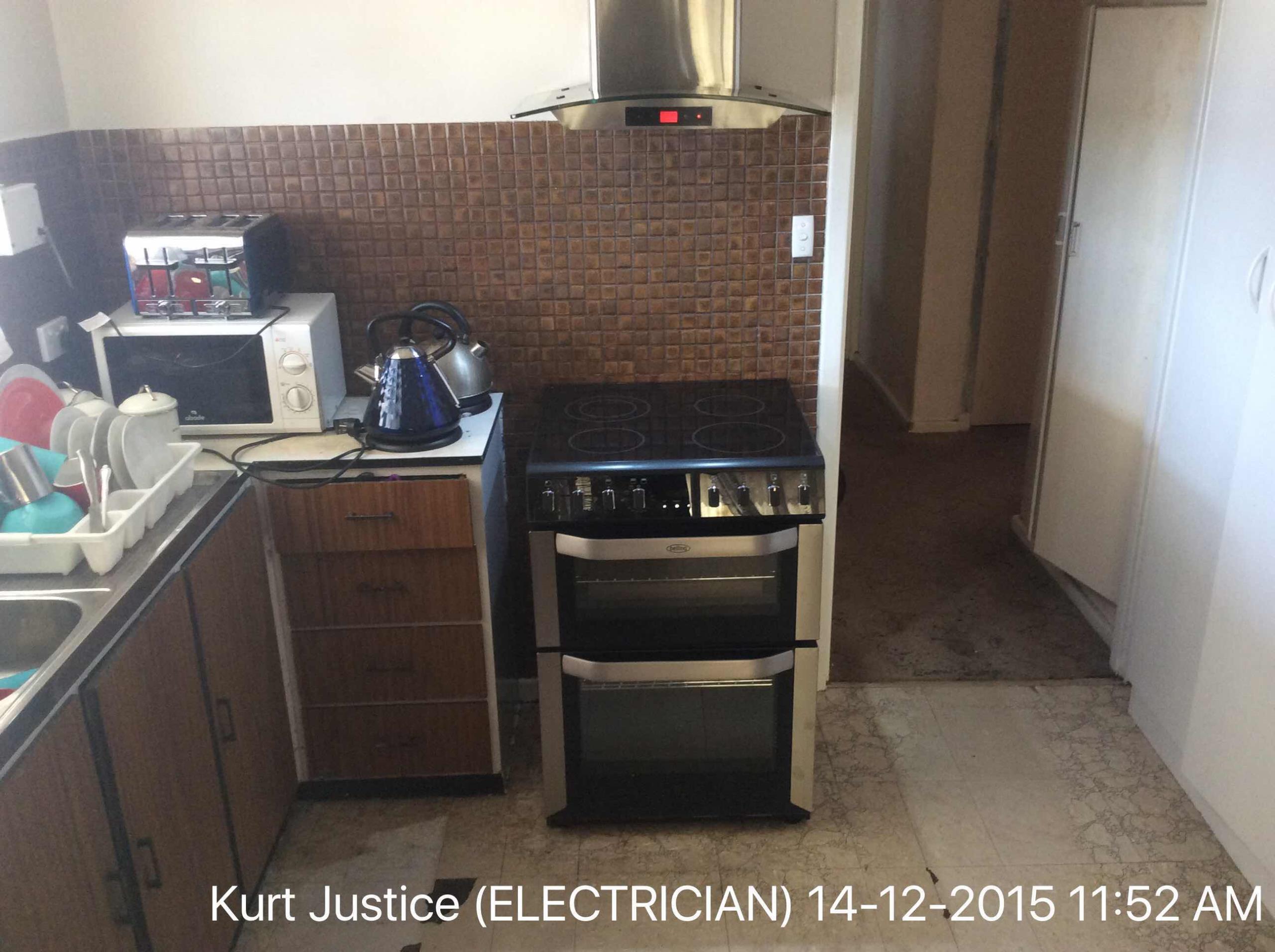 Install customer supplied Rangehood and oven