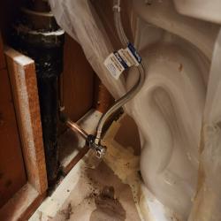 Replaced toilet supply stop and flex as well as laboratory hot and cold stops