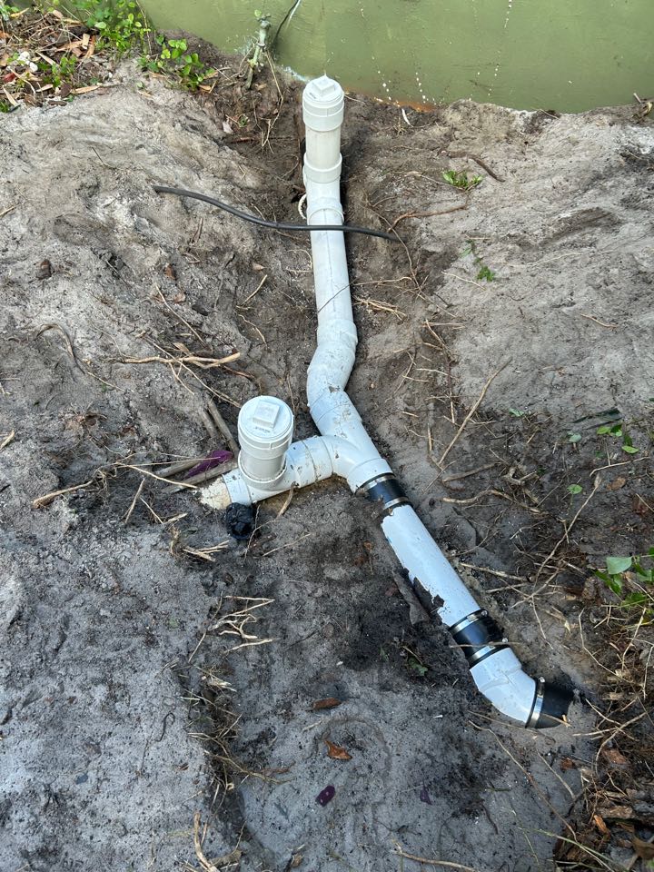 Work Performed:
	•	Removed damaged section of sewer line serving both interior bathrooms
	•	Installed new PVC piping and added cleanouts for both bathroom branch lines
	•	Excavated work area as needed and properly backfilled upon completion
	•	Reset one commode and ensured proper seal and operation
	•	Electric cleaned main sewer line out to the road
	•	Tested for proper function and ensured no leaks present
	•	Cleaned up work area upon completion