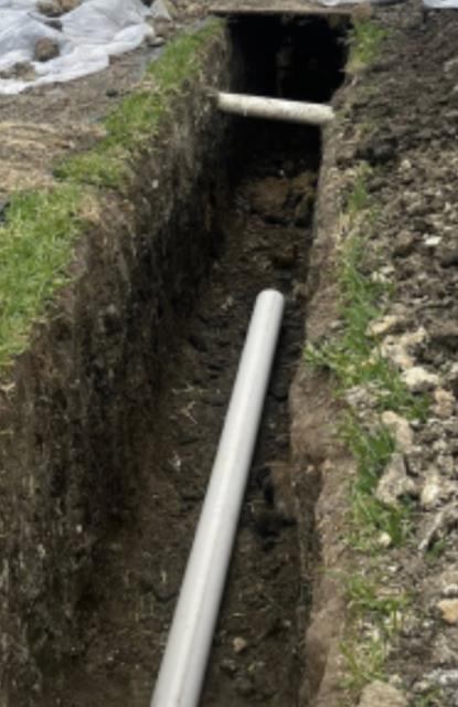 Replace section of old cast iron sewer line at front yard