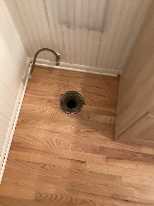 Completed installation of two new toilets, reset one existing toilet, replaced four toilet water valves, and reconnected lavatory vanity plumbing. Used protective drop cloths throughout work area to protect newly refinished floors. All plumbing connections were tested and verified operational.