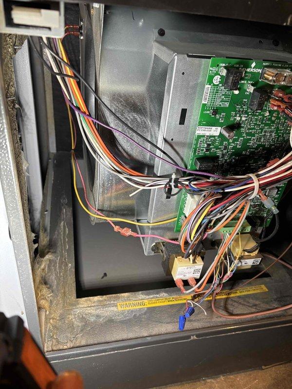 Performed routine furnace maintenance including comprehensive system tune-up. Inspected circuit board and electrical connections for proper operation. Serviced Breathclean air purification system (Model #7200, S/N 202103757), replacing UV light bulb and filter as scheduled maintenance requirement.