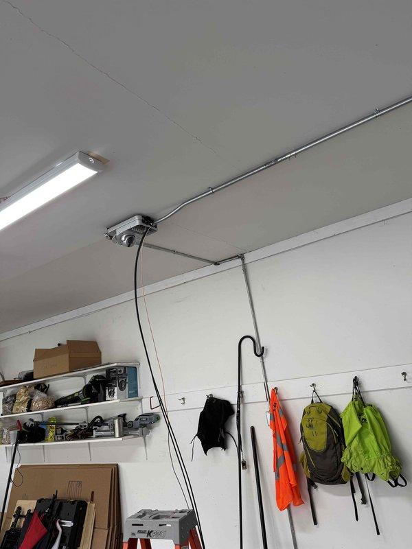 Installed a 240V EV charging circuit from the 150amp Eaton CH electrical panel through the unfinished basement to the garage, utilizing EMT conduit for protection. Successfully mounted and hardwired the Xcel-supplied ChargePoint EV charger to the garage ceiling with 60amp fusing (48amp output), and completed programming and setup of the charging system.