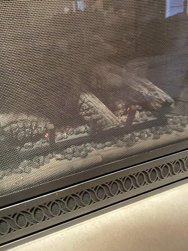 Performed annual heating maintenance on gas fireplace. Identified a displaced log that had shifted from its proper mounting position. Restored log to correct location and confirmed proper flame pattern. System is now functioning normally with appropriate combustion readings.