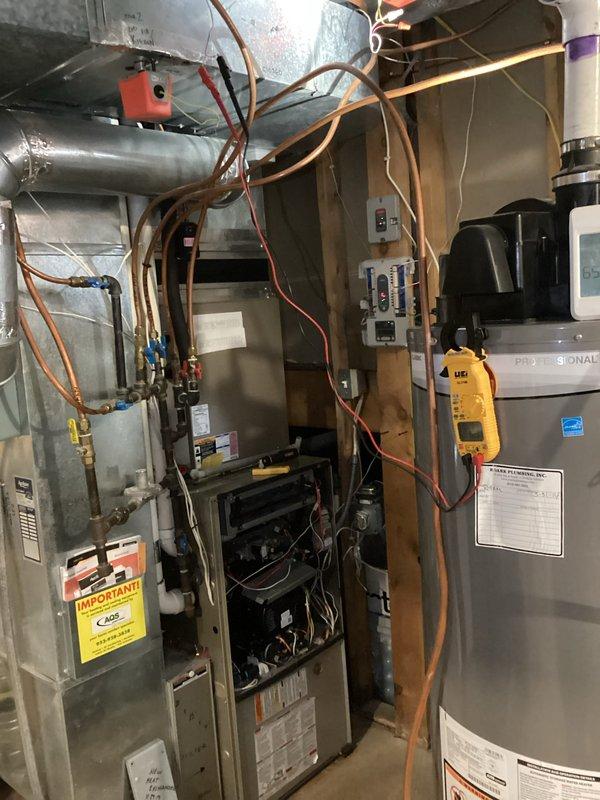 Diagnosed temperature inconsistency in dual-zone system caused by loss of power to zone dampers. Replaced failed Honeywell zone controller module to restore proper functionality to 10-year-old furnace system.